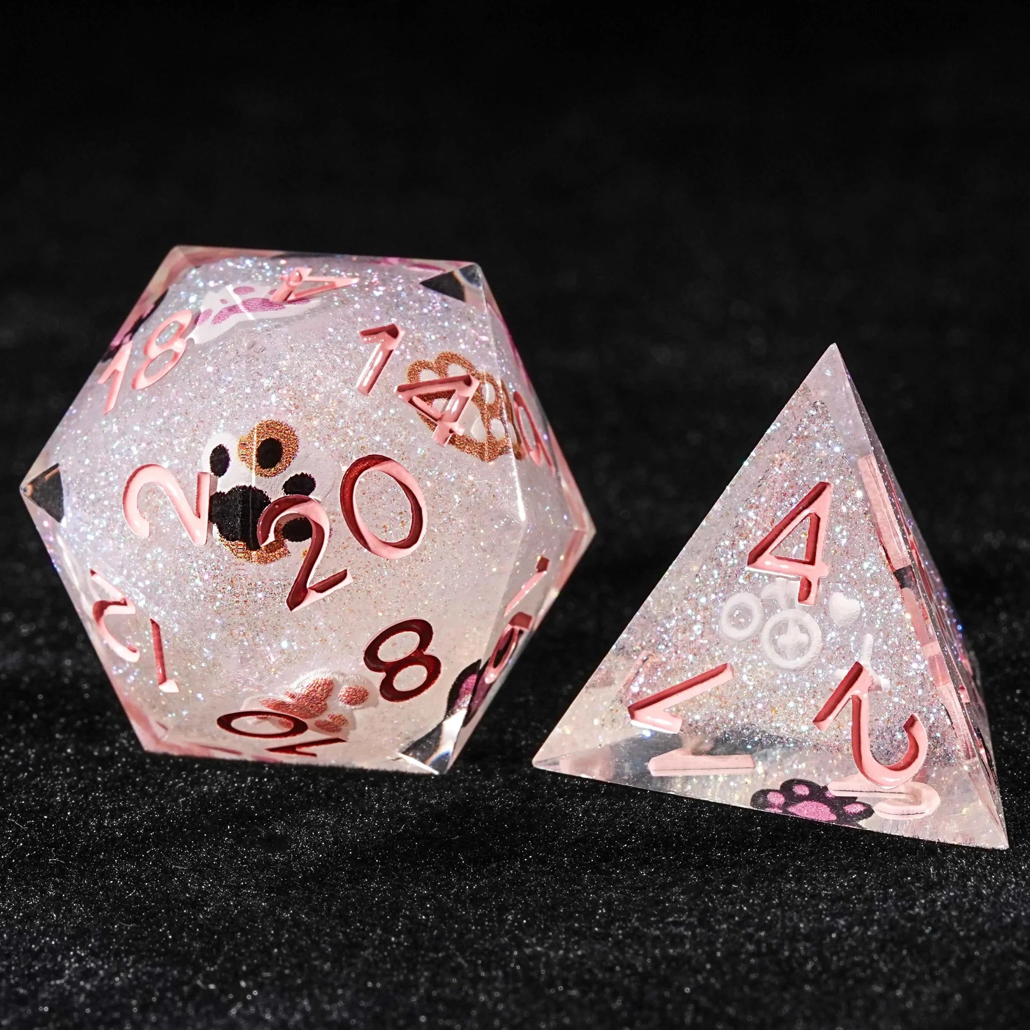 Pink Glitter Resin DND Polyhedron D20 and D4 Dice with pink numbers and various cute cat paw prints | Bear Dice