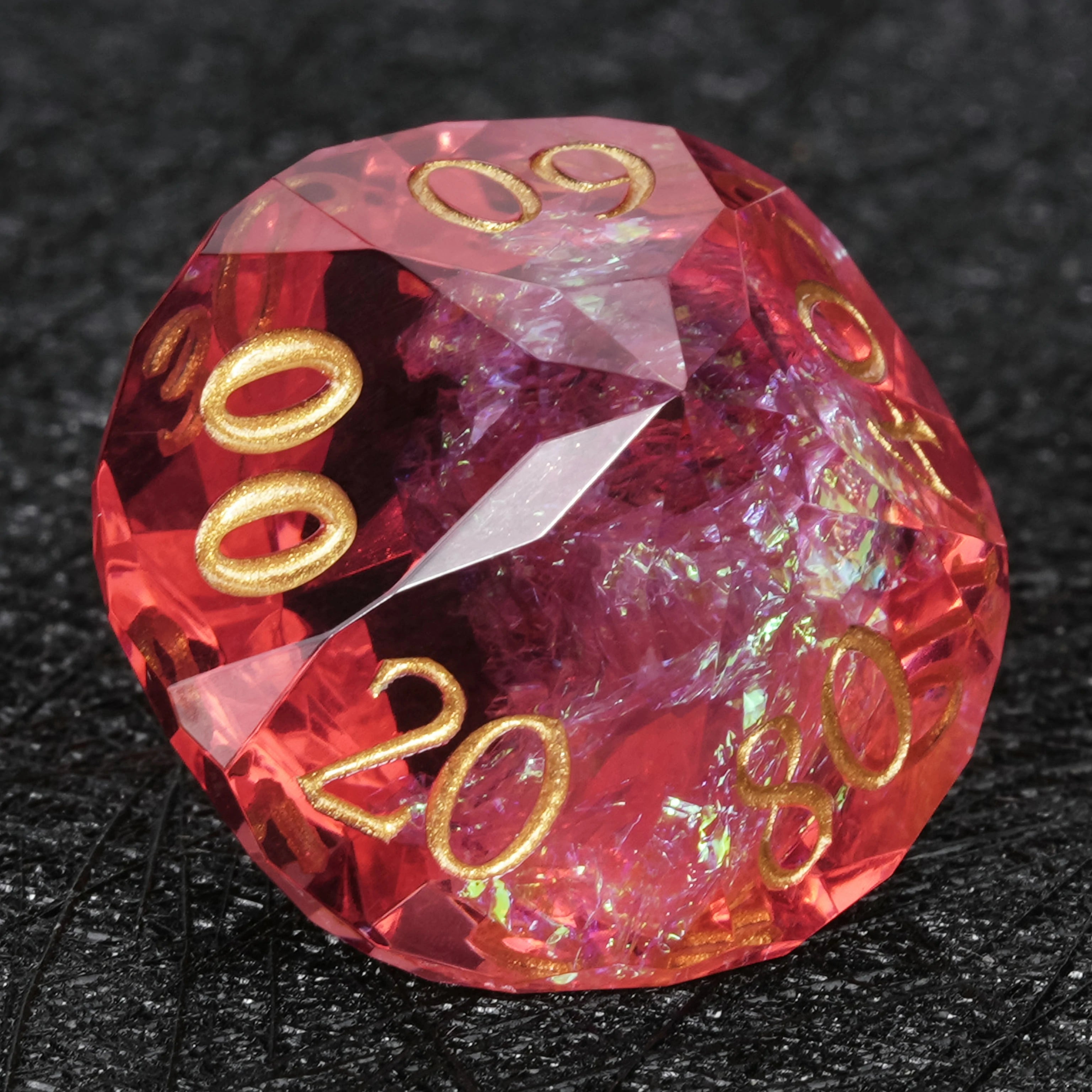 Red resin DND dice set D12 side angle view