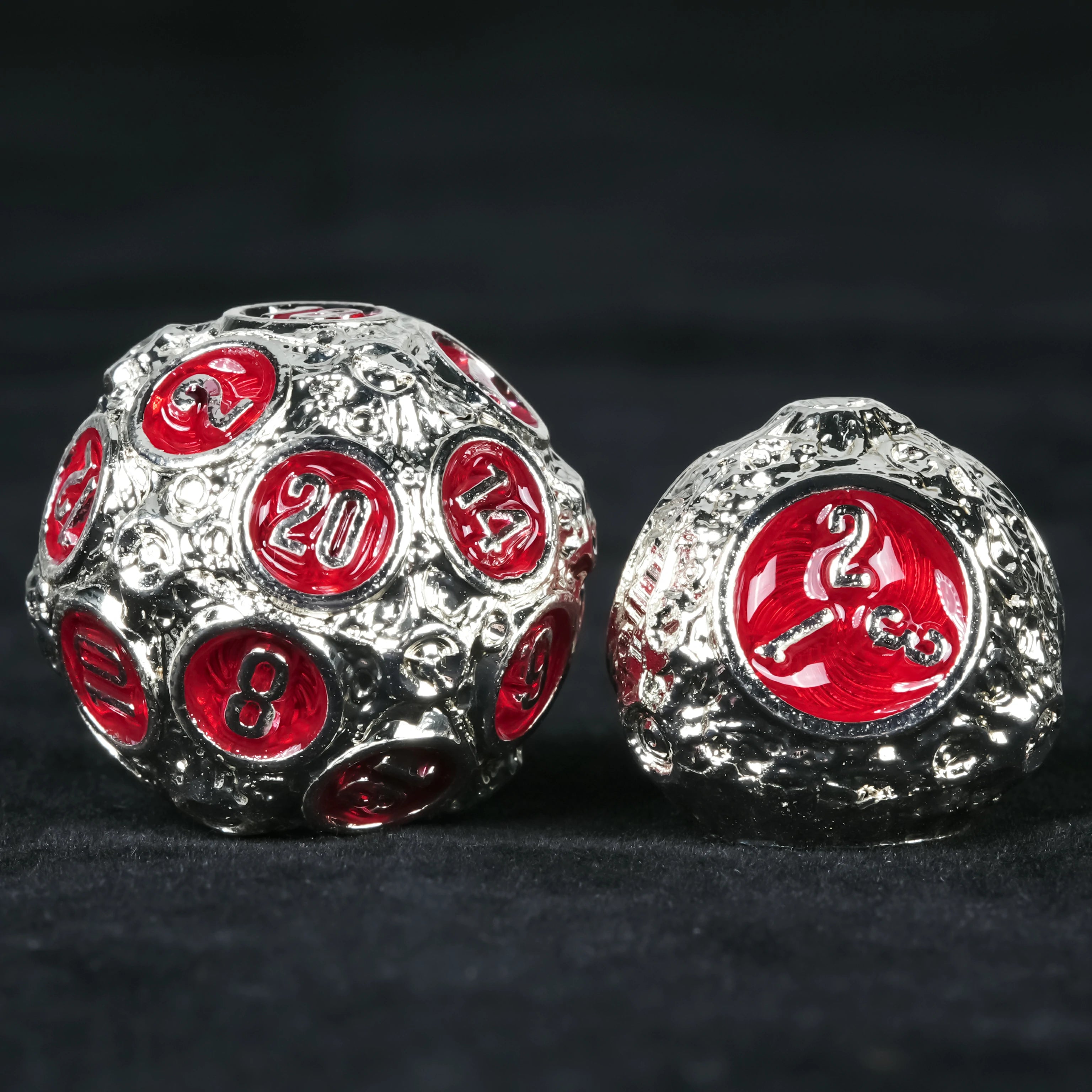 Spherical Planet Metal Dice Set – D10 close-up showing red enamel numbers on silver metal