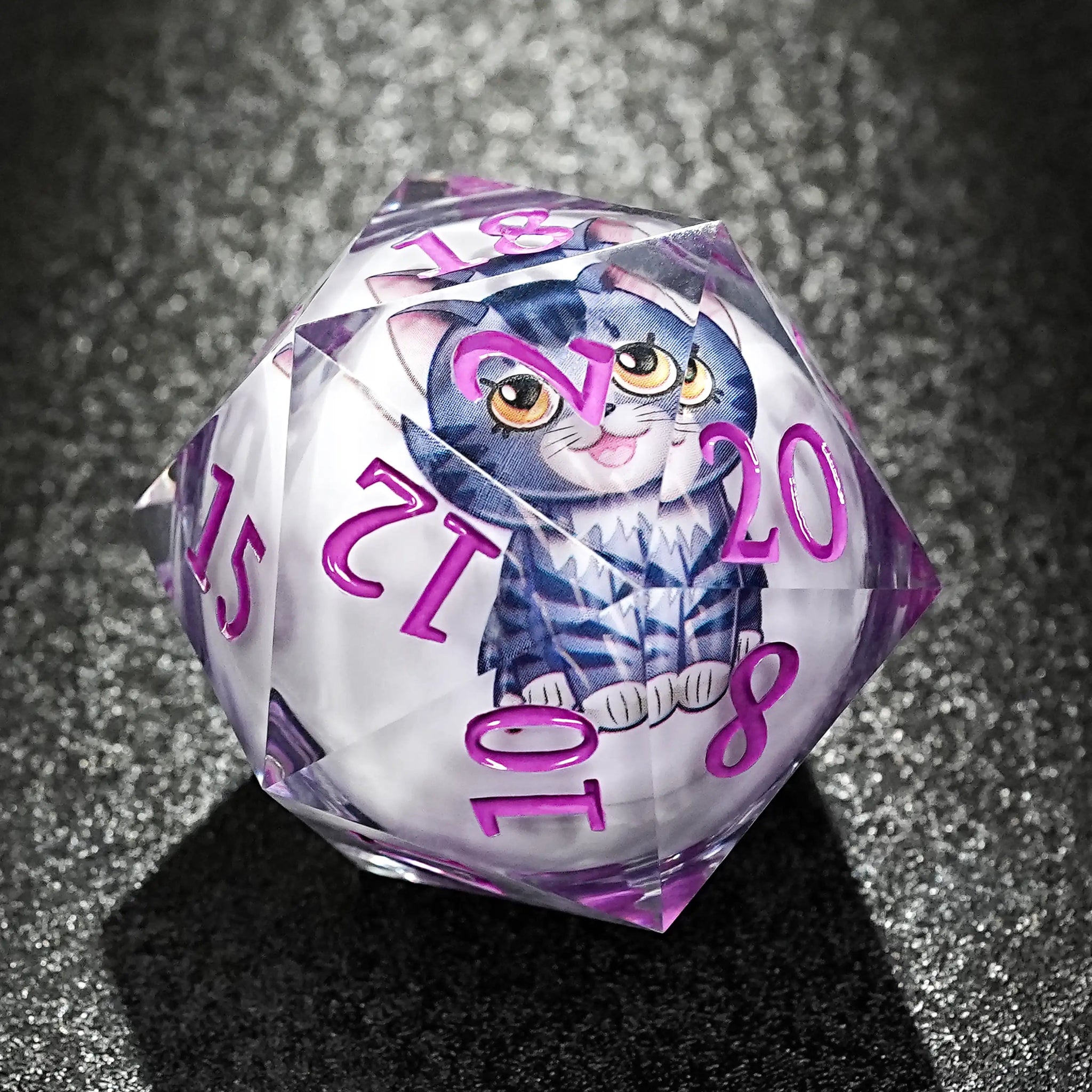 50mm clear resin DND D20 dice with purple engraved numbers. The core of the dice is a white sphere with a cute cartoon blue cat printed on it. The D20 dice emits colored light when thrown | Bear Dice
