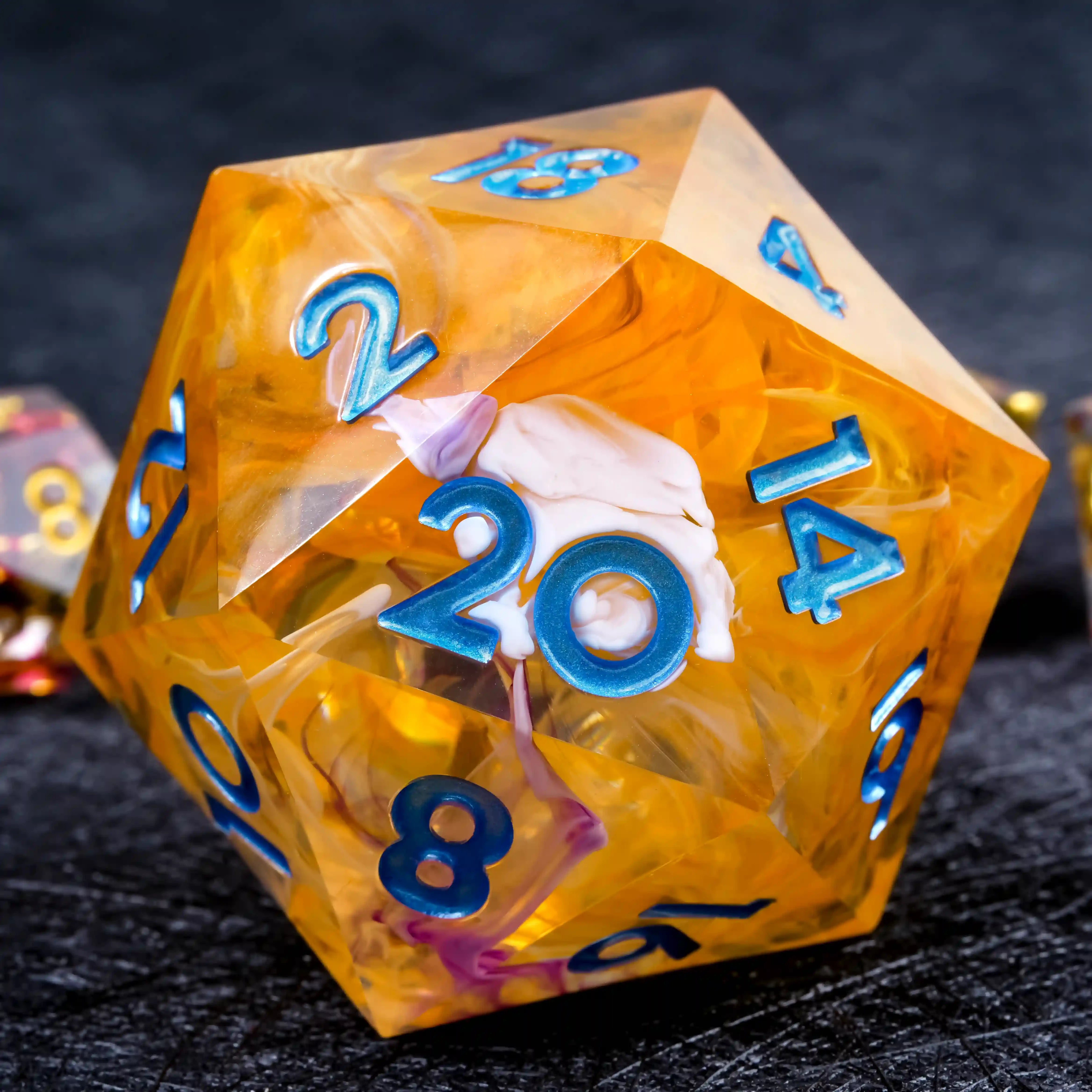 35mm Yellow Swirl Transparent Resin D20 Dice – Blue Numbers | Bear Dice