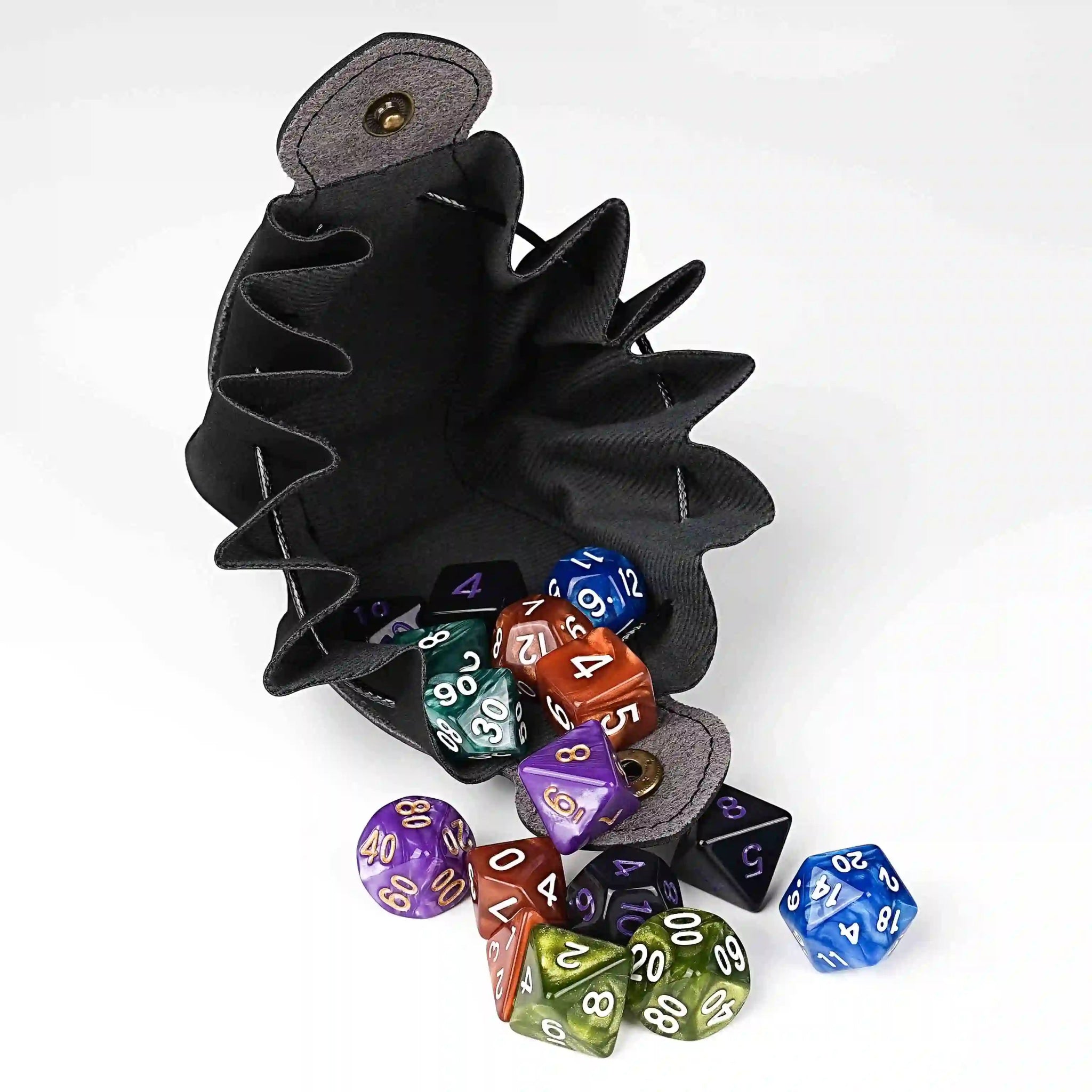 Handcrafted black leather DND drawstring dice bag with button closure and printed Bear Dice logo. Holds two acrylic dice sets for easy portability. | Bear Dice