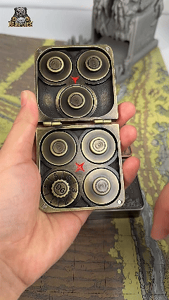 The 7 DND roulette dice in the bronze pterosaur metal folding dice box are spinning rapidly | Bear Dice