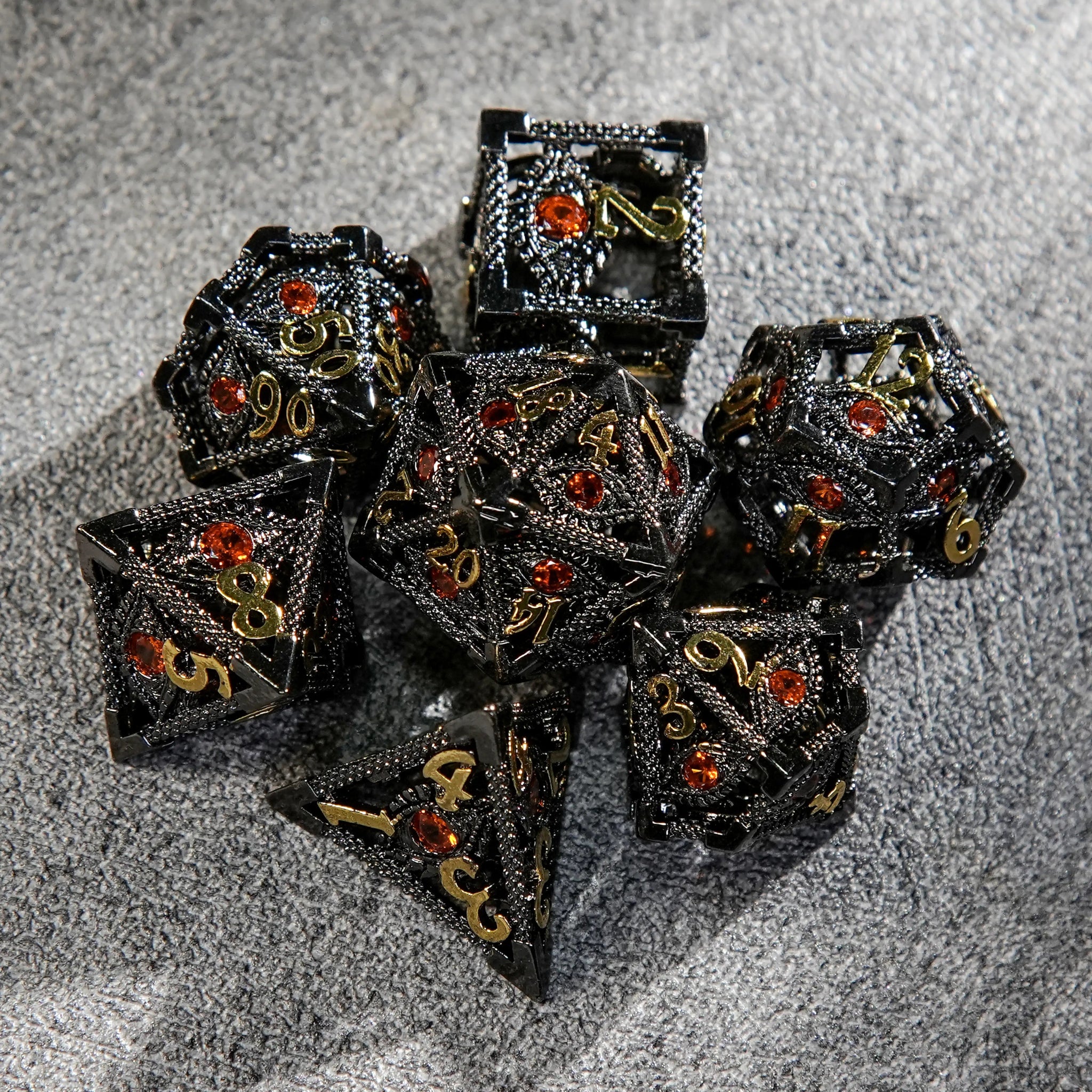 Ruby Demon's Eye Black Metal Hollow DND Dice Set with Engraved Gold Numbers, Perfect for Tabletop Role-Playing Games like Call of Cthulhu and Pathfinder | Bear Dice