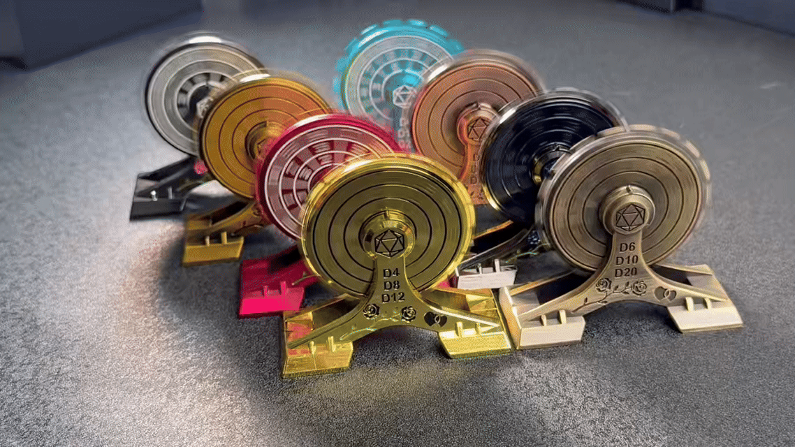 8 different colored Ferris wheel dice spinners arranged in two rows are spinning fast and smoothly, suitable for dice collection and playing tabletop role-playing games | Bear Dice