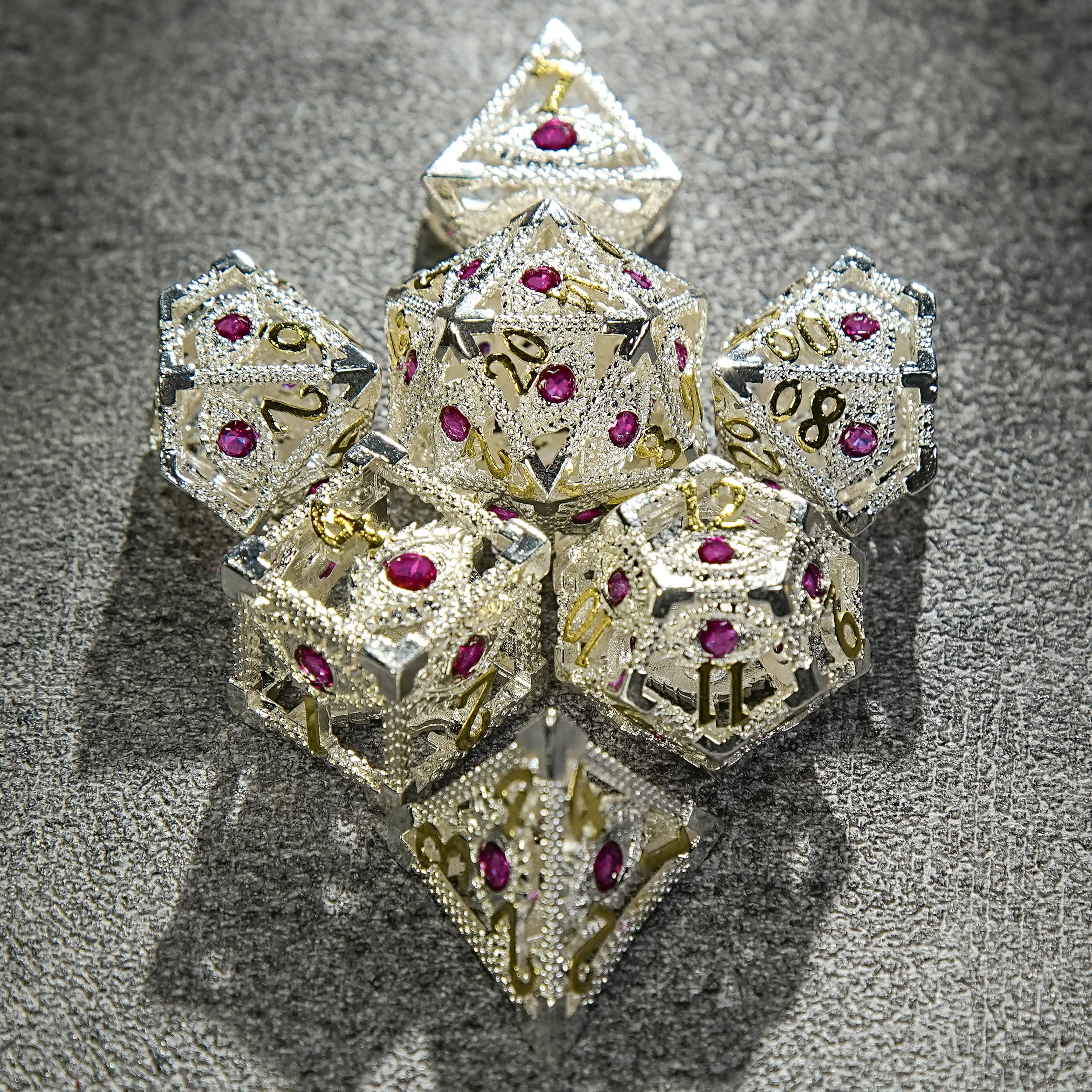 Silver with Pink Gems Dragon's Eye Hollow Metal RPG dice set | Bear Dice