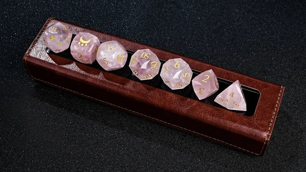 Natural Rose Quartz DND Dice Set Engraved with the Gift of the Nile Pattern, Comes with a Rectangular Leather Transparent Dice Display Case | Bear Dice