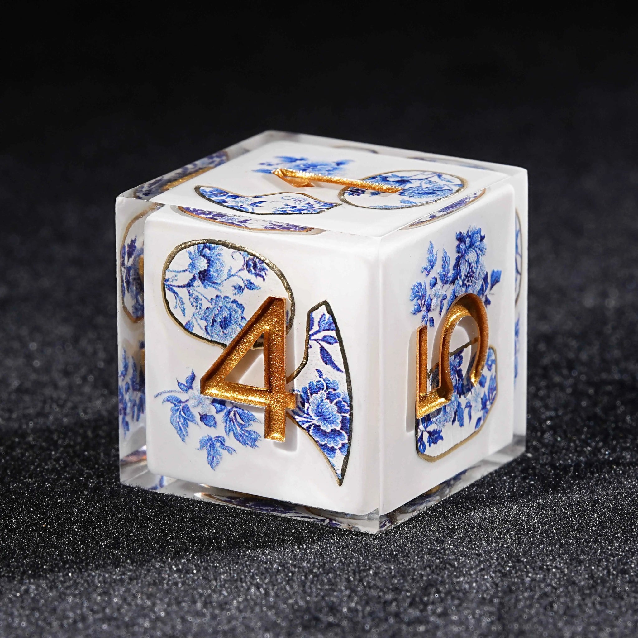 Transparent resin Oriental Blue and White Porcelain DND D6 dice, featuring a blue and white porcelain fragment pattern with blue flowers and plants | Bear Dice