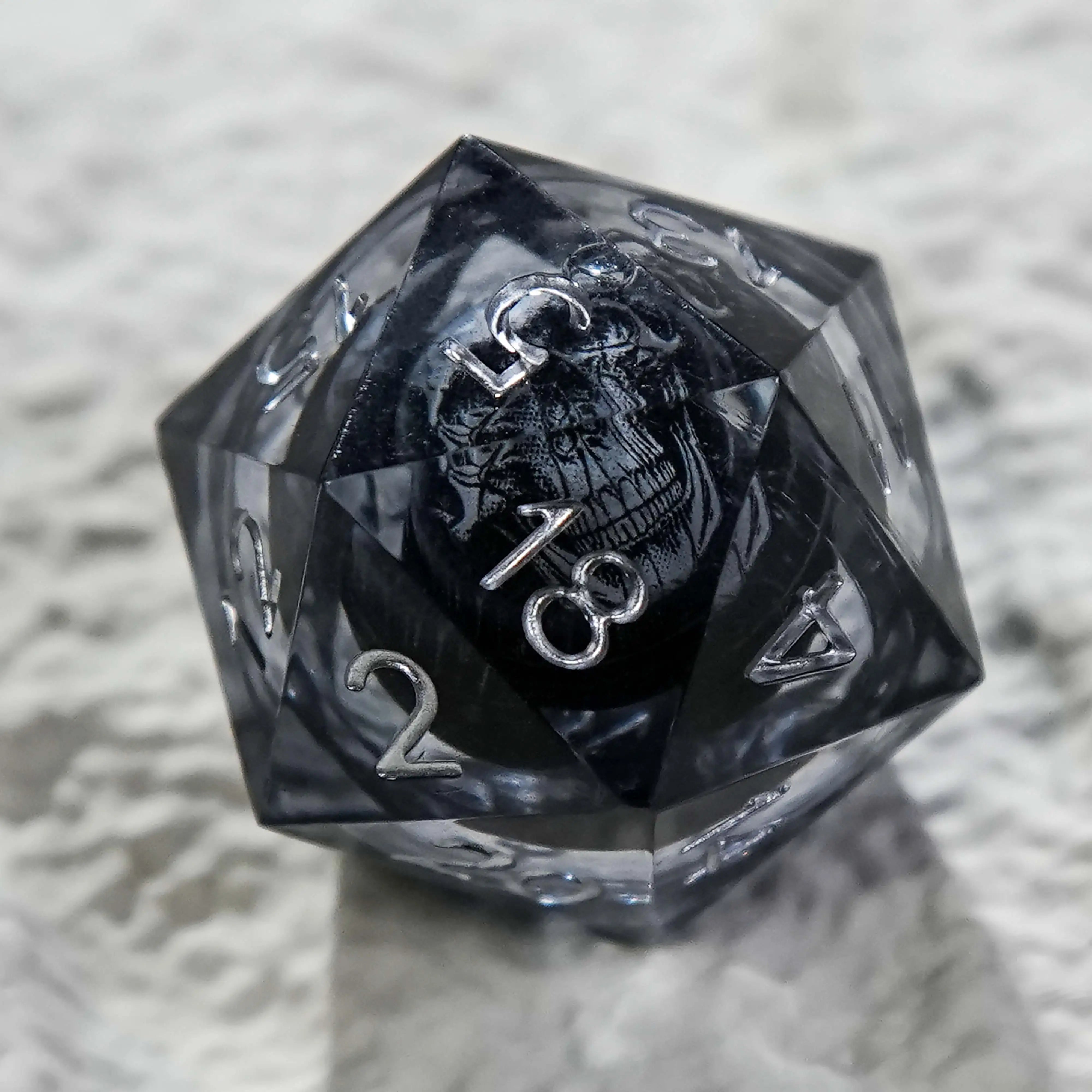 Dark Sorcerer's Skull Frame Liquid Core Resin D20 Dice Silver Font | Bear Dice