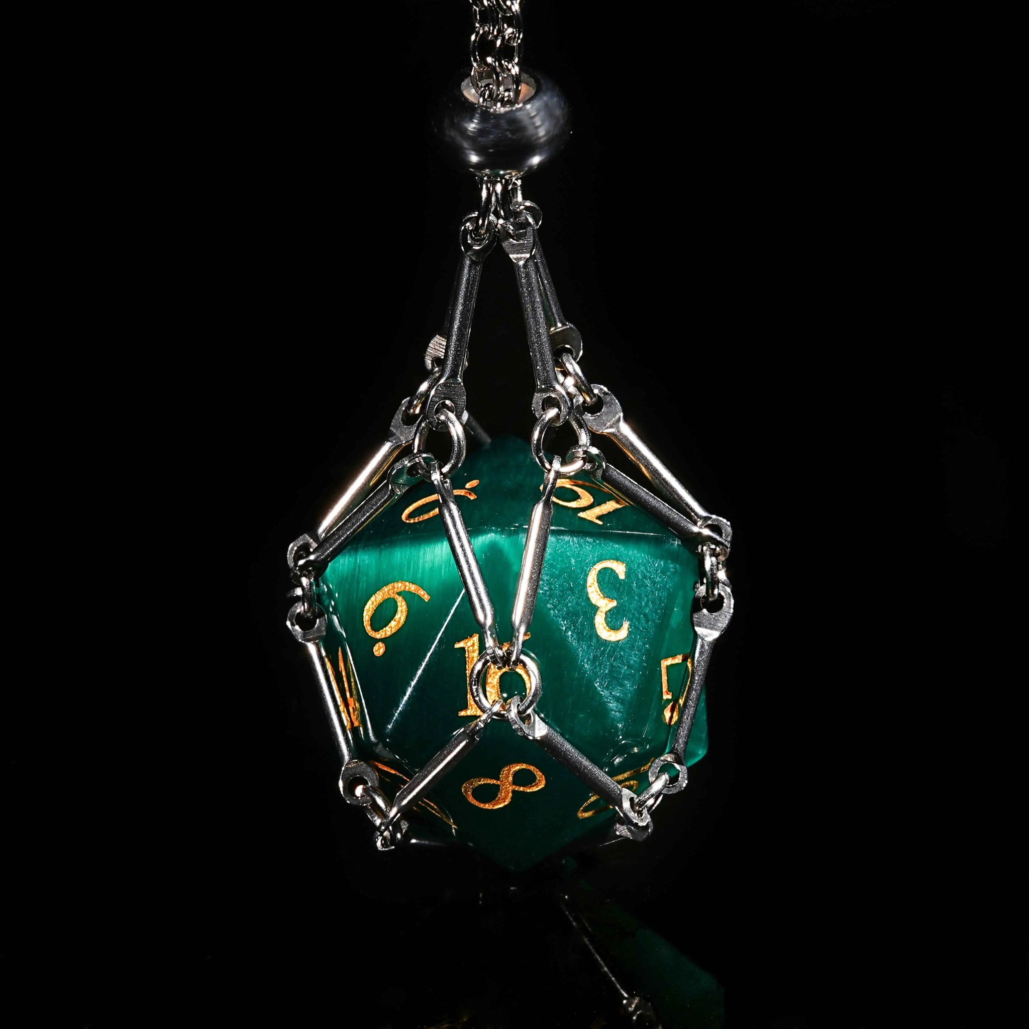 Silver dice necklace containing a DND emerald D20 dice engraved with gold numbers | Bear Dice