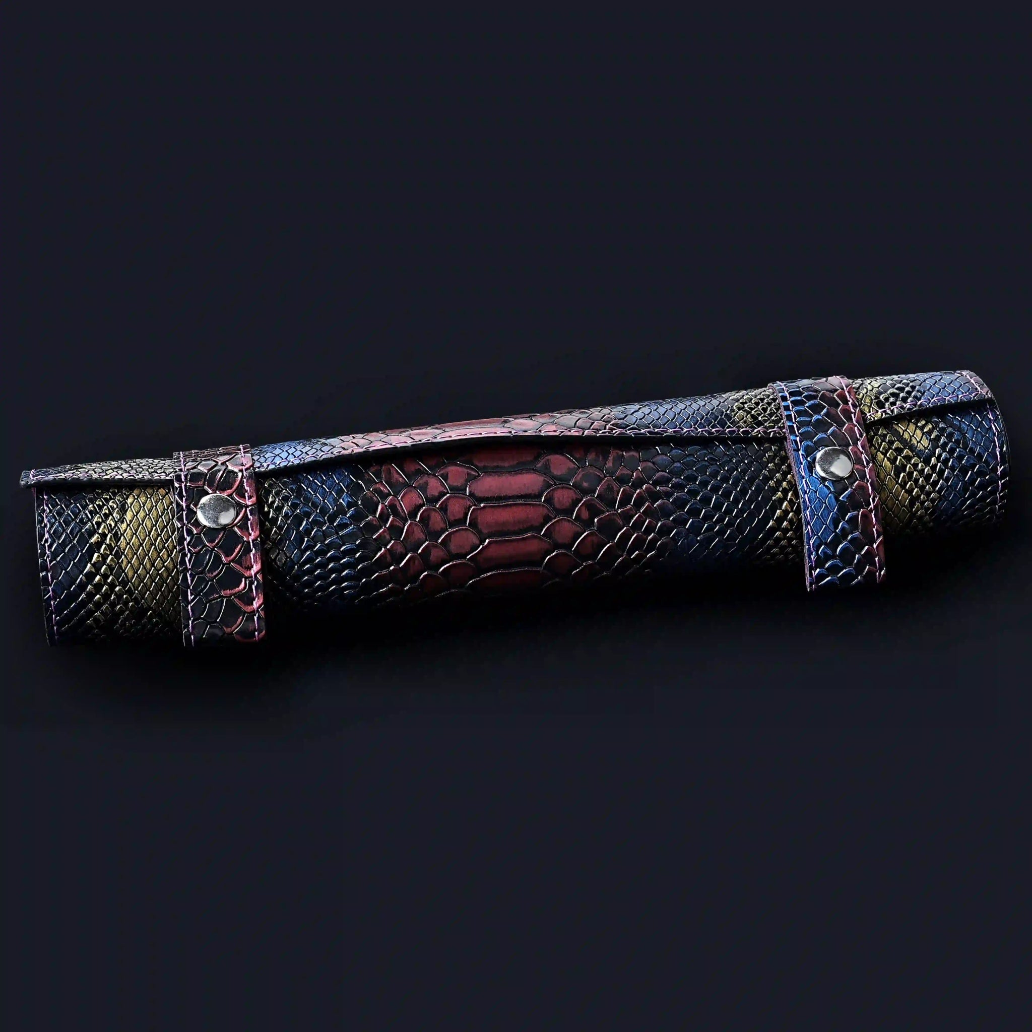 This snakeskin-style leather dice mat, tray, and reel zippered dice bag features two button closures to secure the dice mat and reel. The cool, realistic design makes it perfect for D&D, gift giving, or as an accessory. | Bear Dice