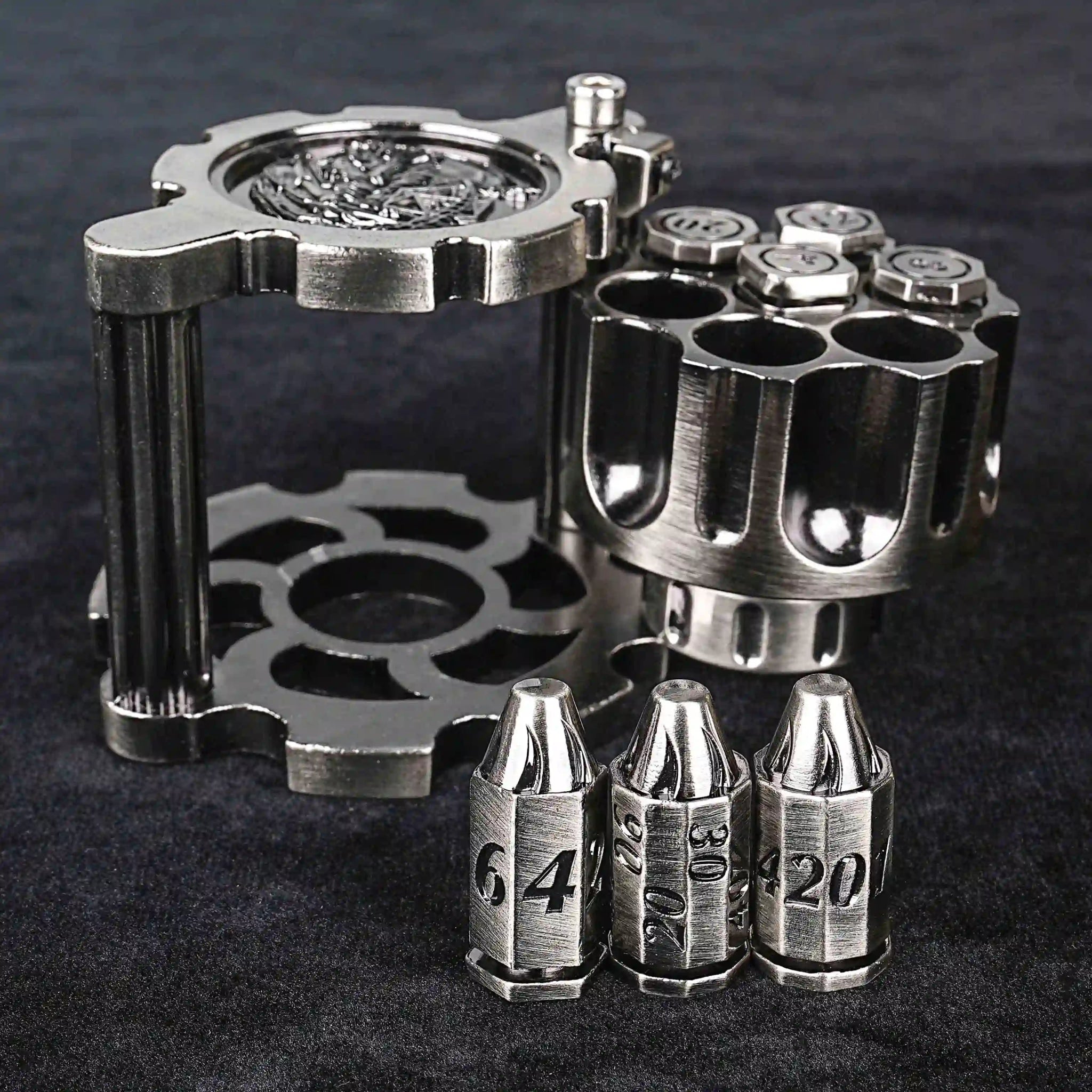 Unique DND Revolver Bullet Dice Set: Antique Nickel Revolver Dice Rotating Magazine, loaded with four Antique Nickel DND Bullet Dice, and DND D10, D6, and D% Bullet Dice placed in front of the magazine | Bear Dice