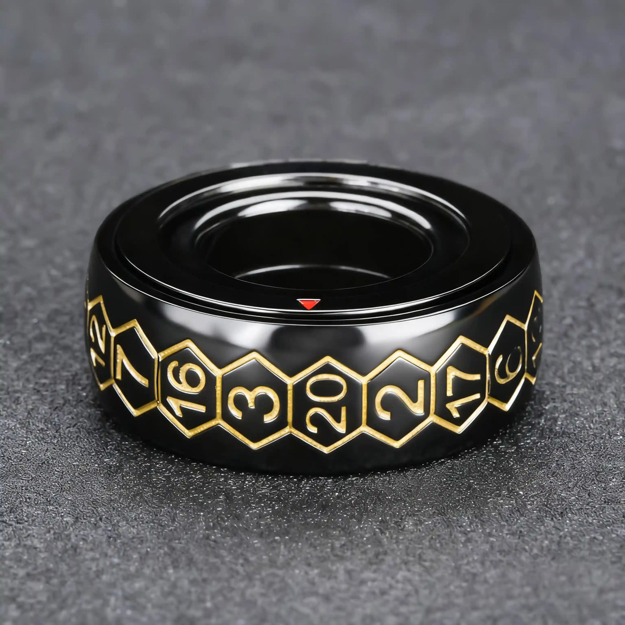 Cool black fingertip spinning D20 dice ring with gold numbers, a red arrow in the middle layer points to the final reading | Bear Dice