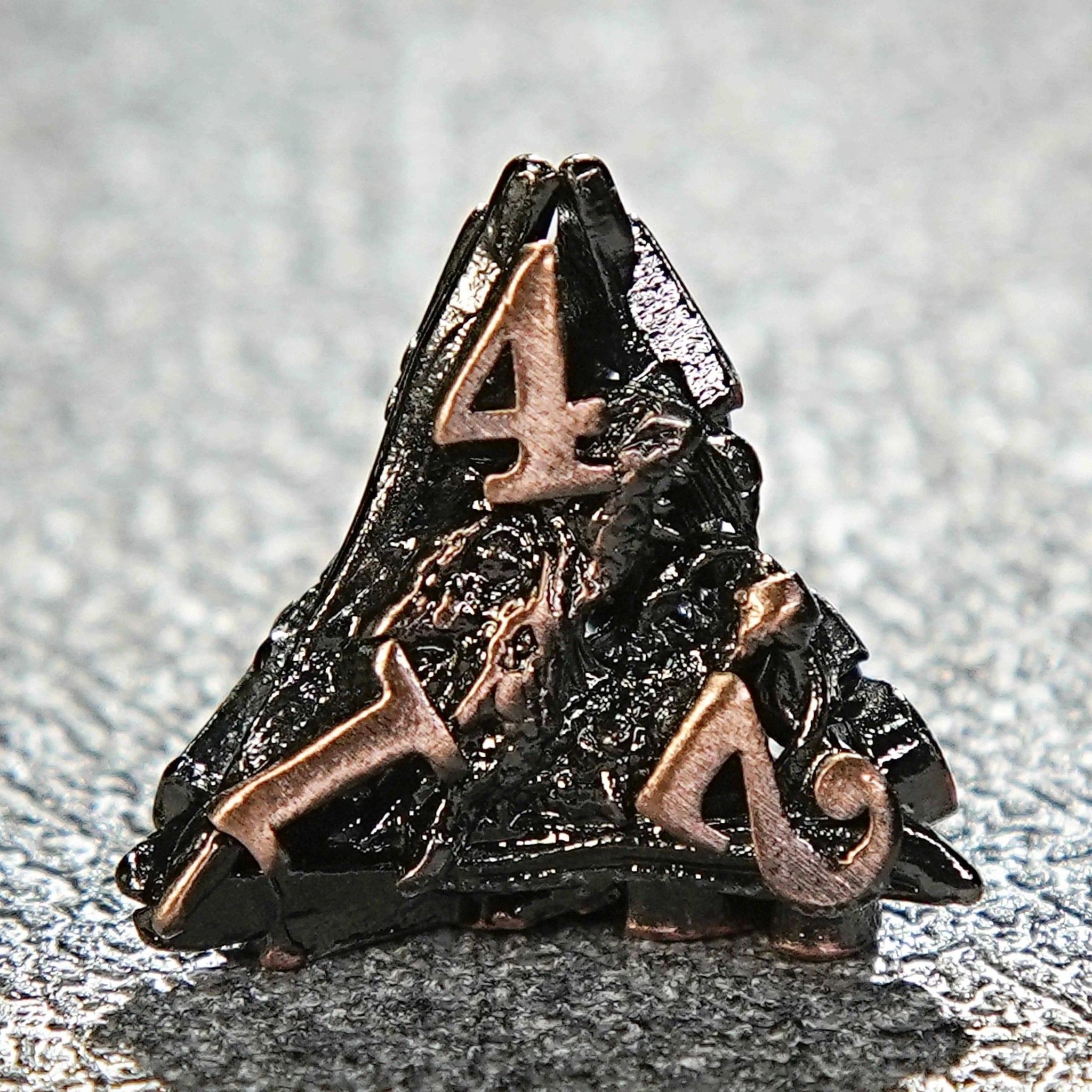 Triangular pyramidal copper-colored metal hollow 3D dragon head D4 dice | Bear Dice
