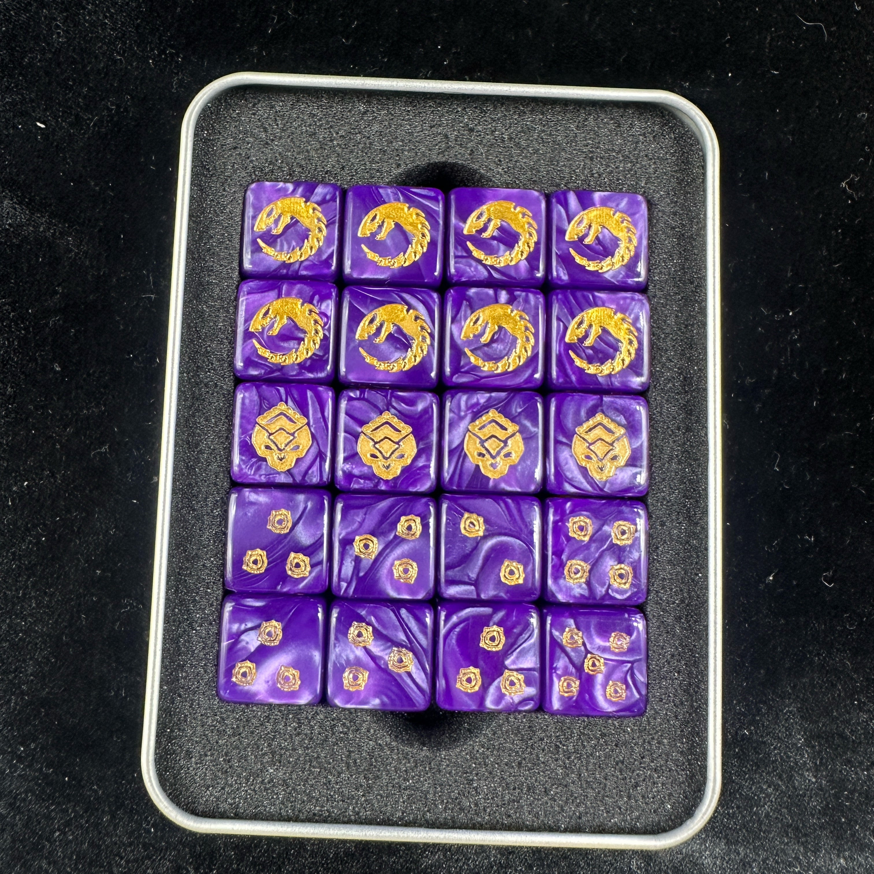 Genestealer Cults Ouroboros D6 Dice Set of 20 — Top View in Metal Tin Box with Foam Insert, Showing All Gold Rune Faces Including Ouroboros and Diamond Emblem | Bear Dice