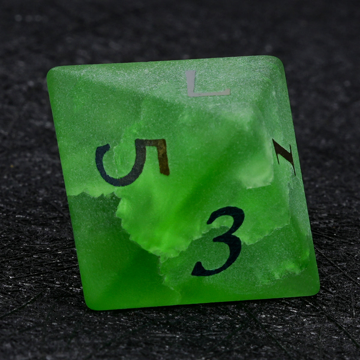 Green crackle frosted glass D8 die with electroplated numbers, showing triangular faces with the numbers 5 and 3.