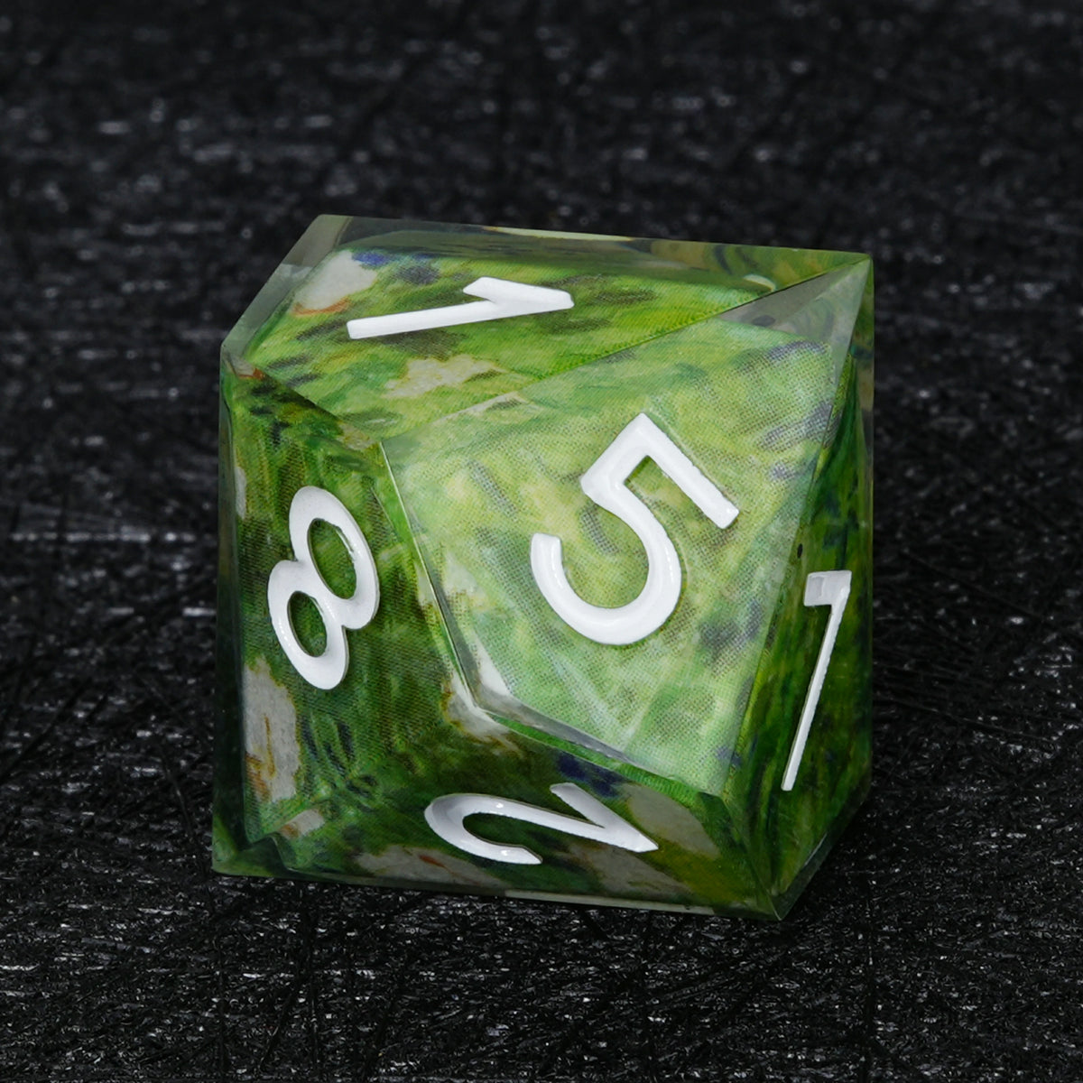 Ten-sided green resin D10 with wraparound floral decal artwork, white numbers and a clear outer layer