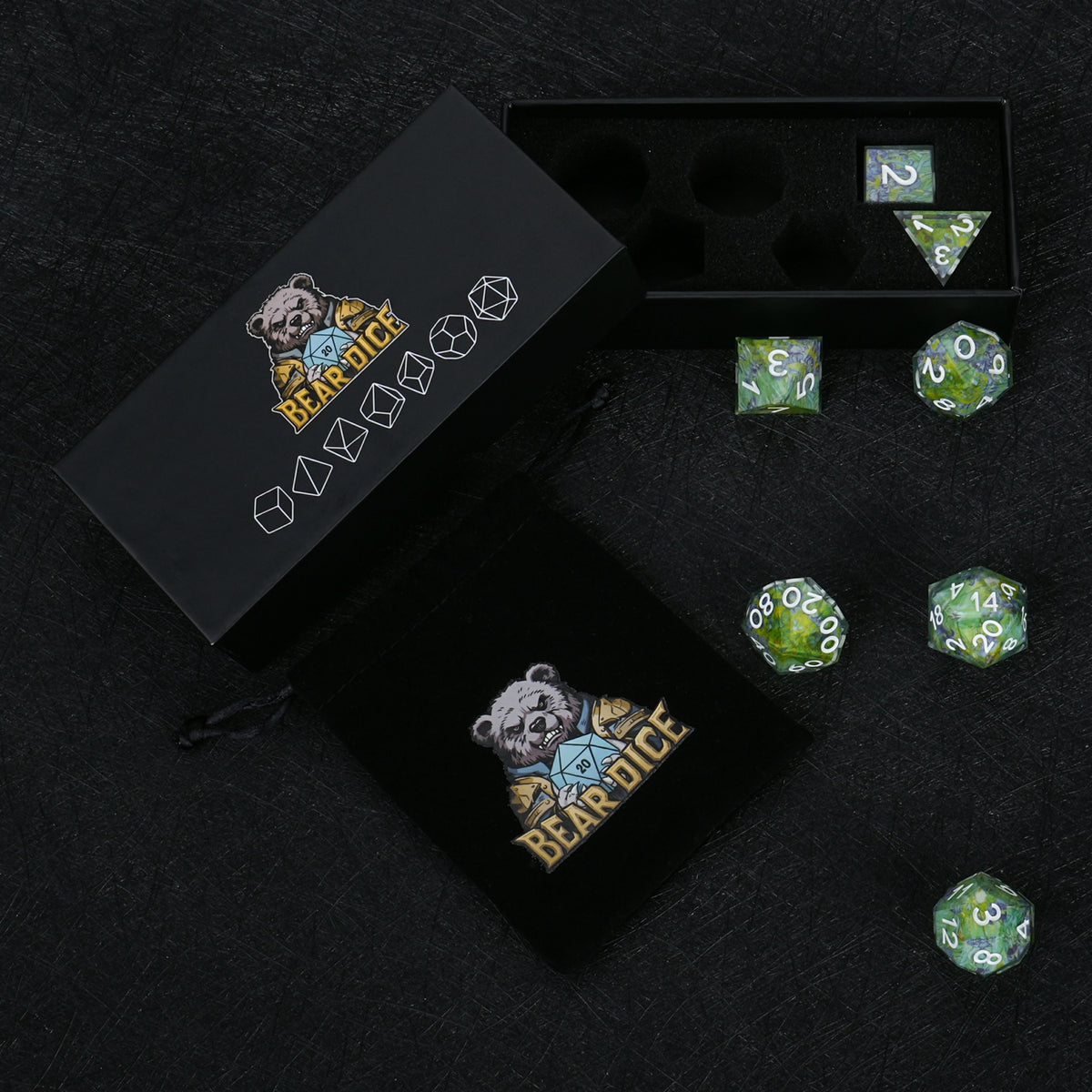 Seven green floral resin dice with white numbers, displayed with a black Bear Dice box, foam insert and drawstring pouch