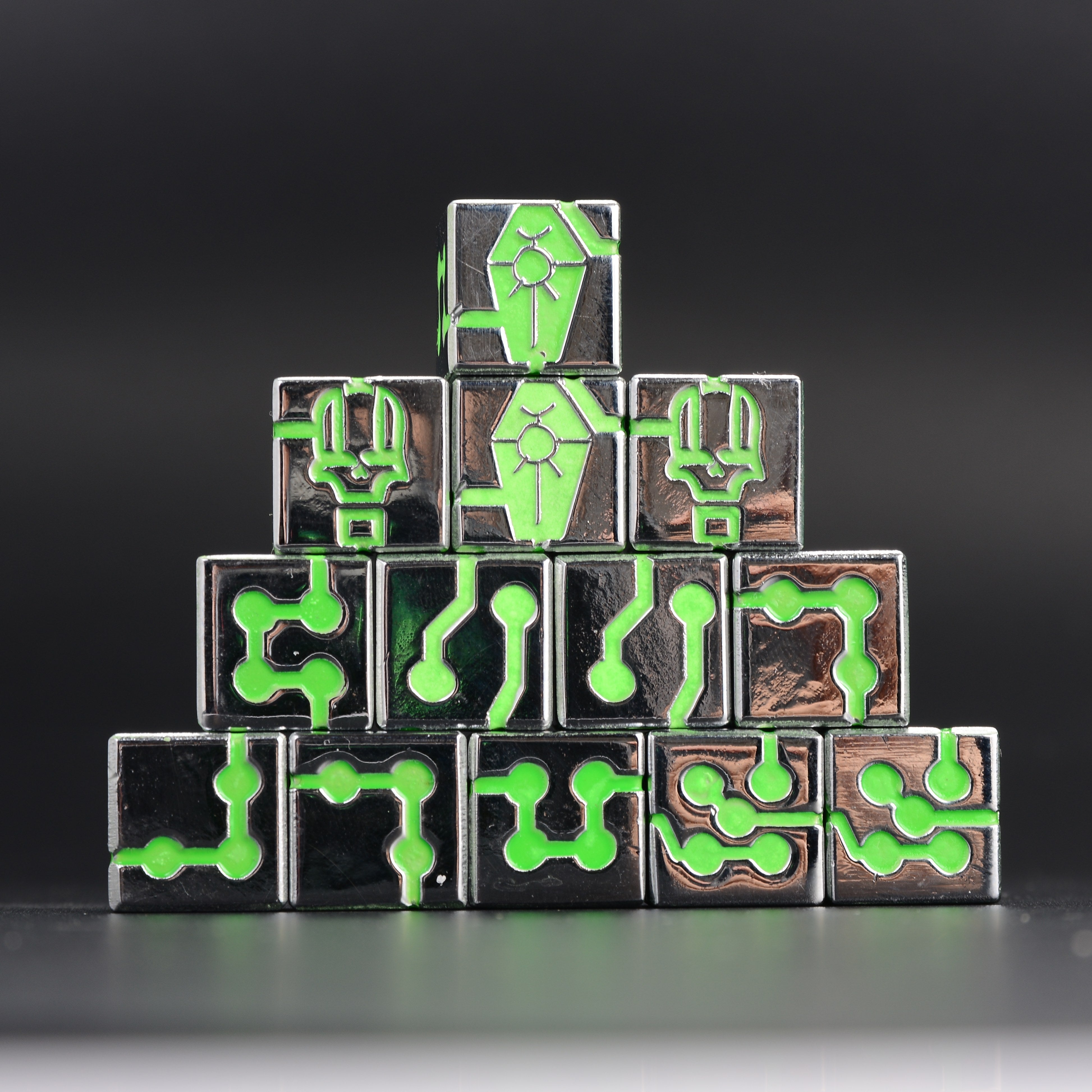 Warhammer 40K Necron-Themed Green Fluorescent D6 Dice 10-piece pyramid stack with circuit glyph engravings | Bear Dice