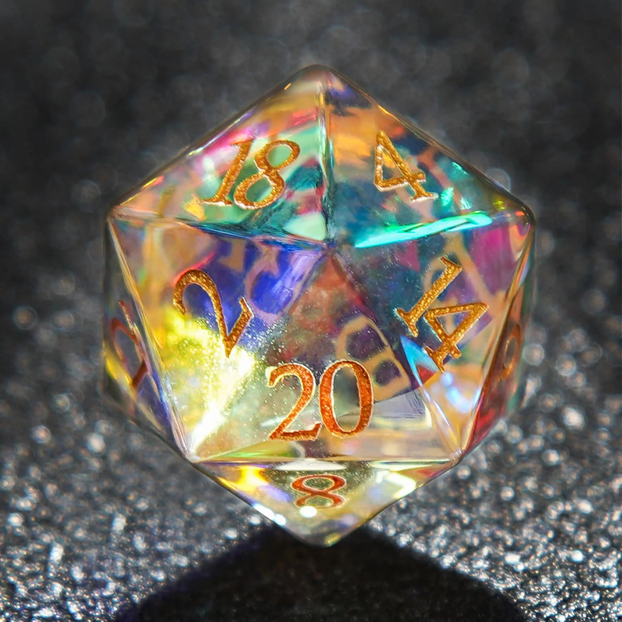 Prism glass D20 dice, engraved with gold numbers, refract colorful light and are incredibly beautiful. | Bear Dice