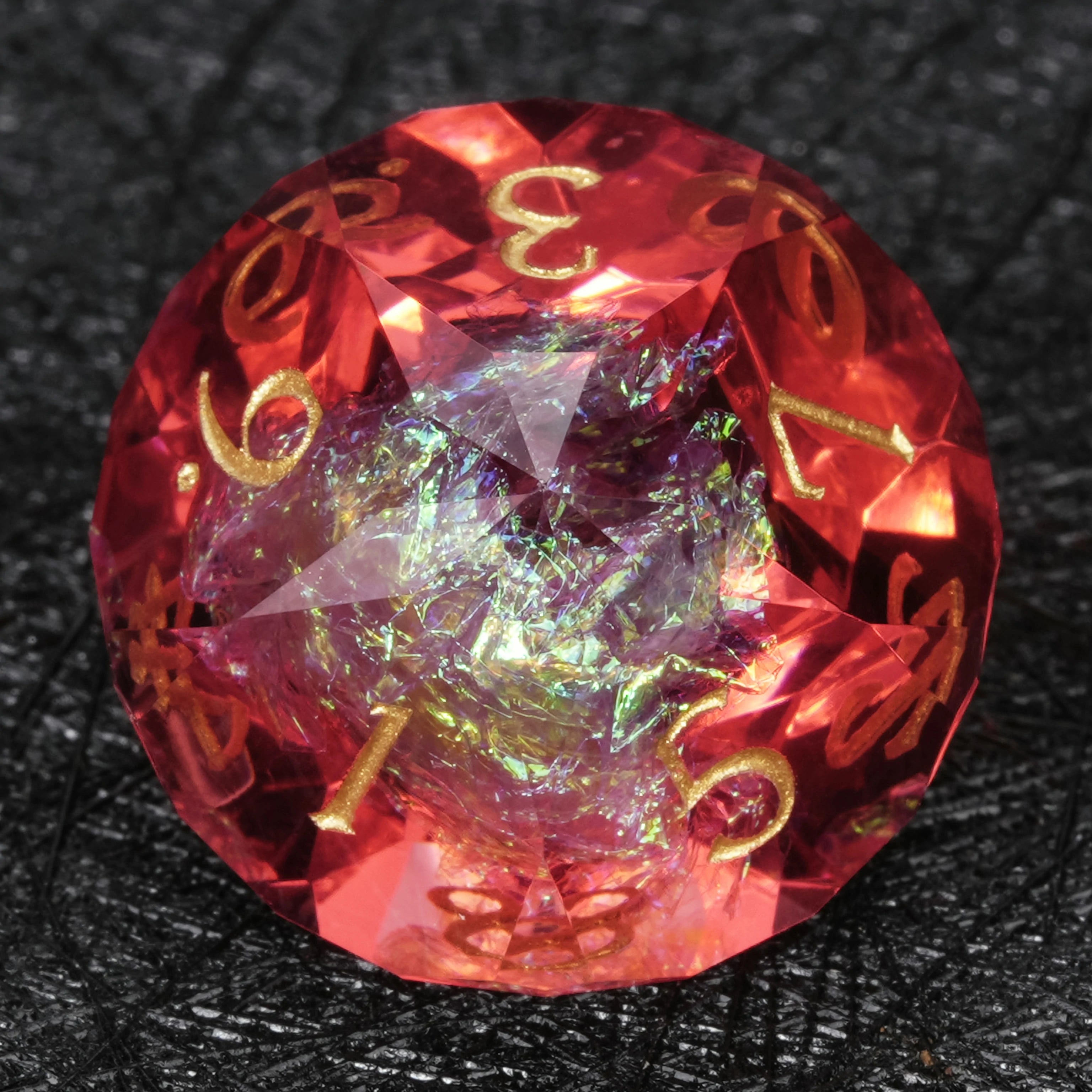Red resin DND dice set beauty shot on dark background