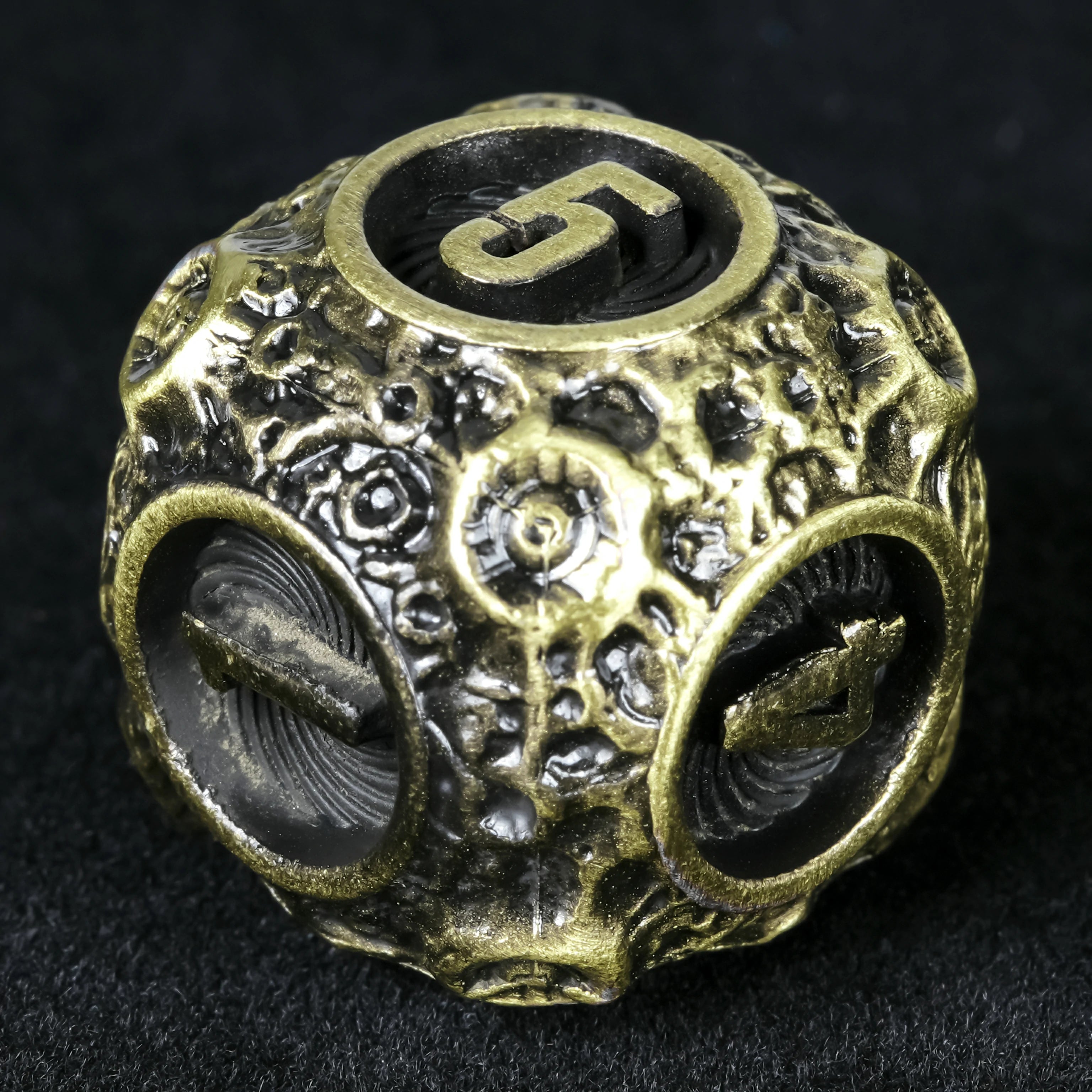 Spherical Planet Metal Dice Set - size comparison between large D20 and small D10 hollow sphere dice