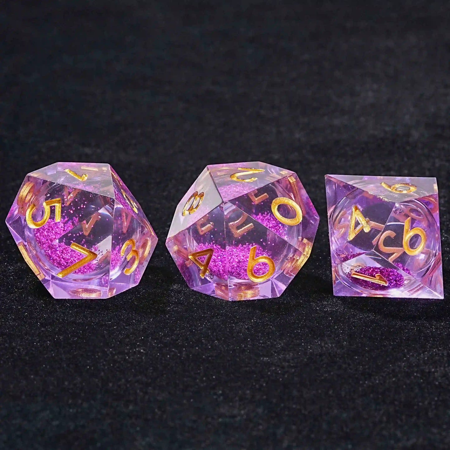 3 purple quicksand liquid core D10 resin dice with gold lettering | Bear Dice