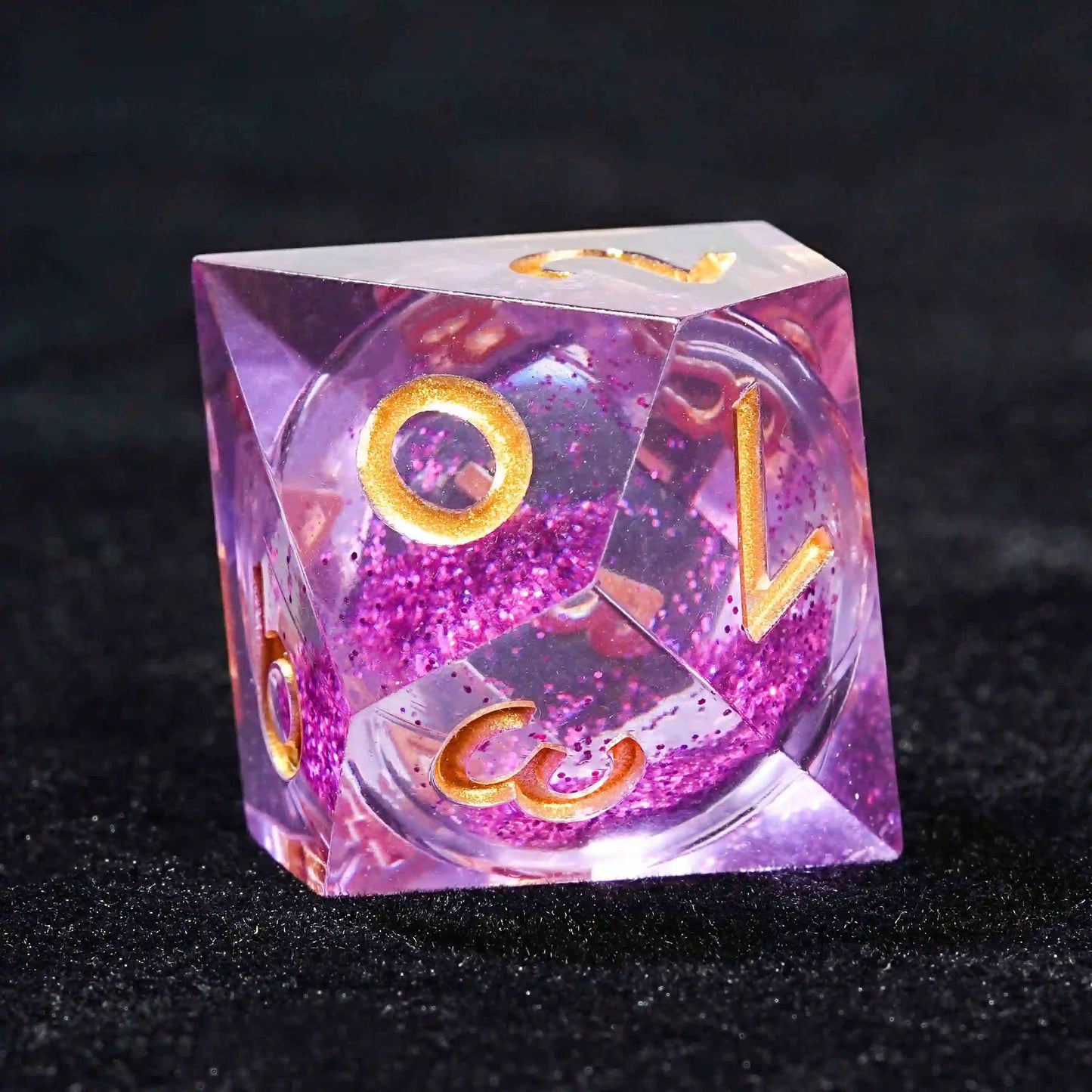 purple quicksand liquid core D10 resin dice with gold lettering | Bear Dice