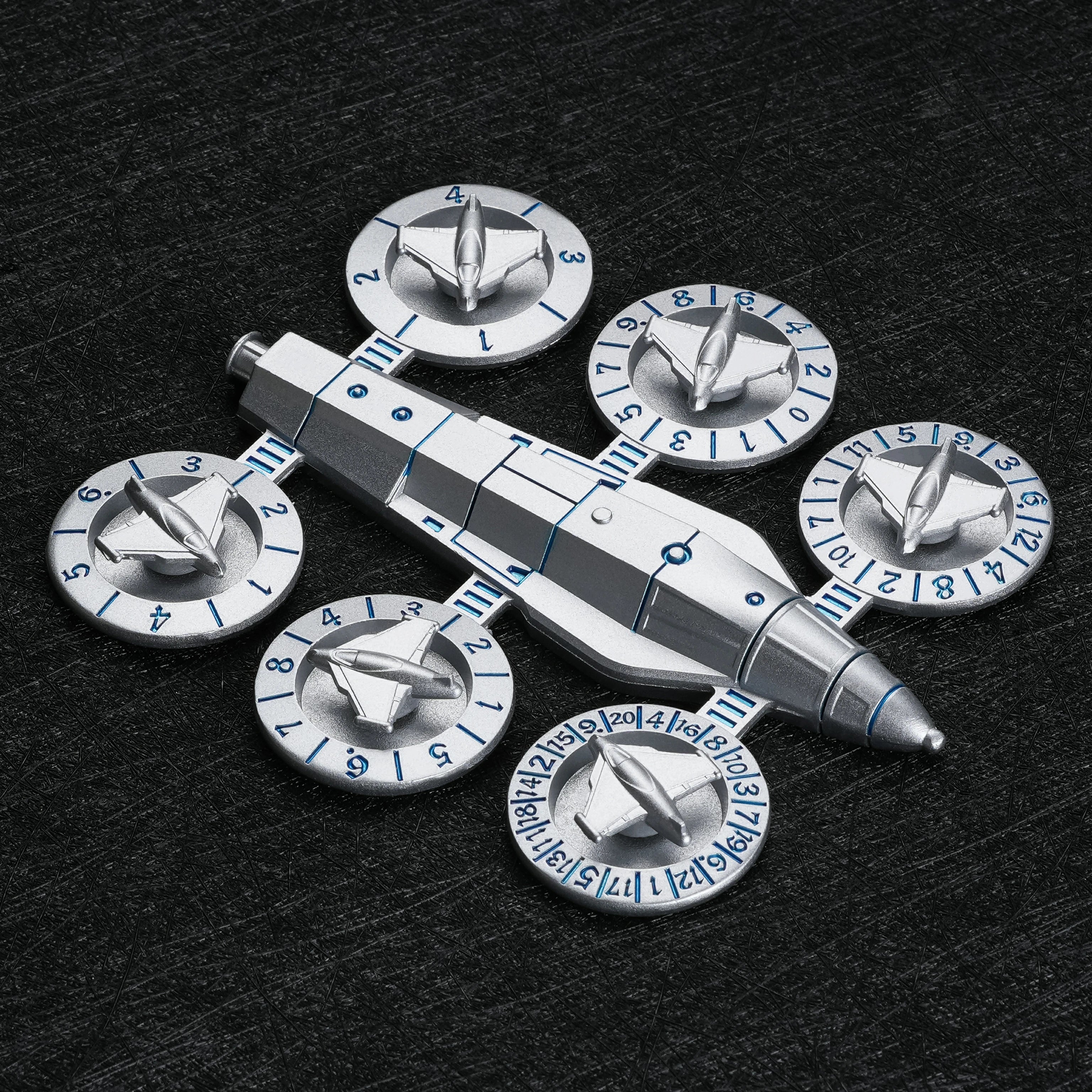 7-in-1 Spaceship Metal Dice Set angled view showing spinner mechanism and numbered rings