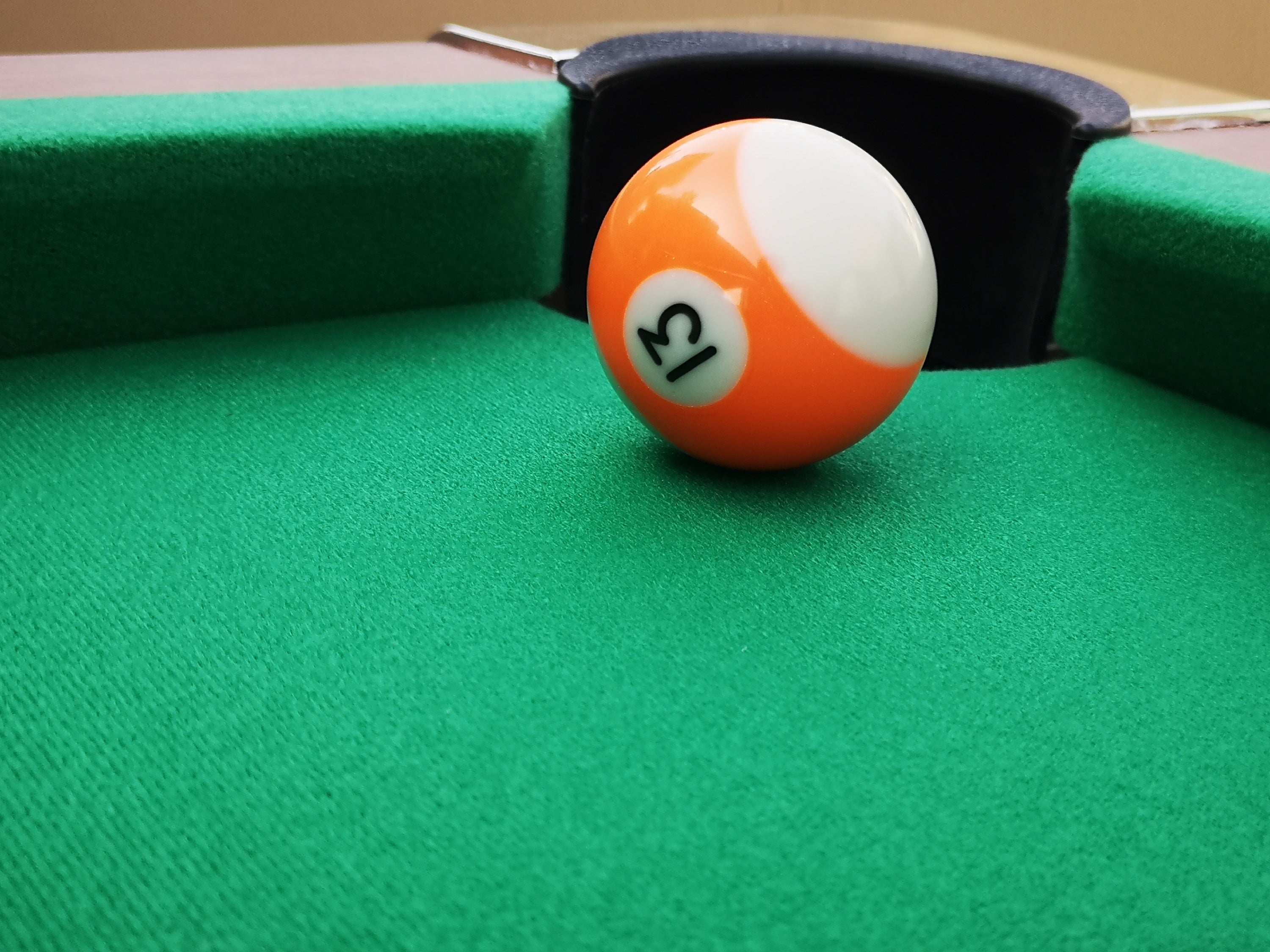 Billiard balls on 63-Inch Green Felt Foldable Wooden Billiard Table green felt surface | Bear Dice