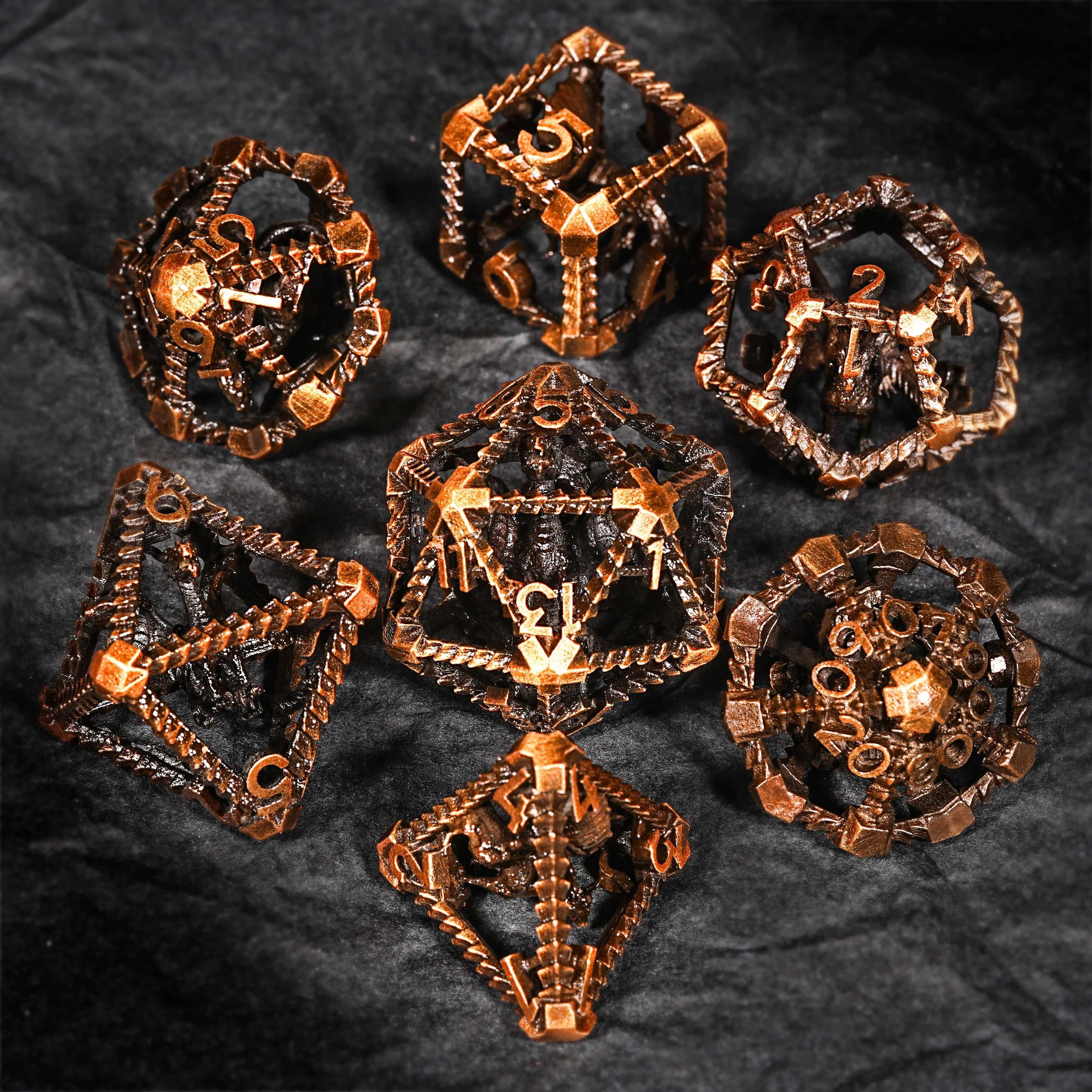 Antique gold metal hollow 3D dragon polyhedron dice set, perfect for TRPG such as Dungeons and Dragons | Bear Dice