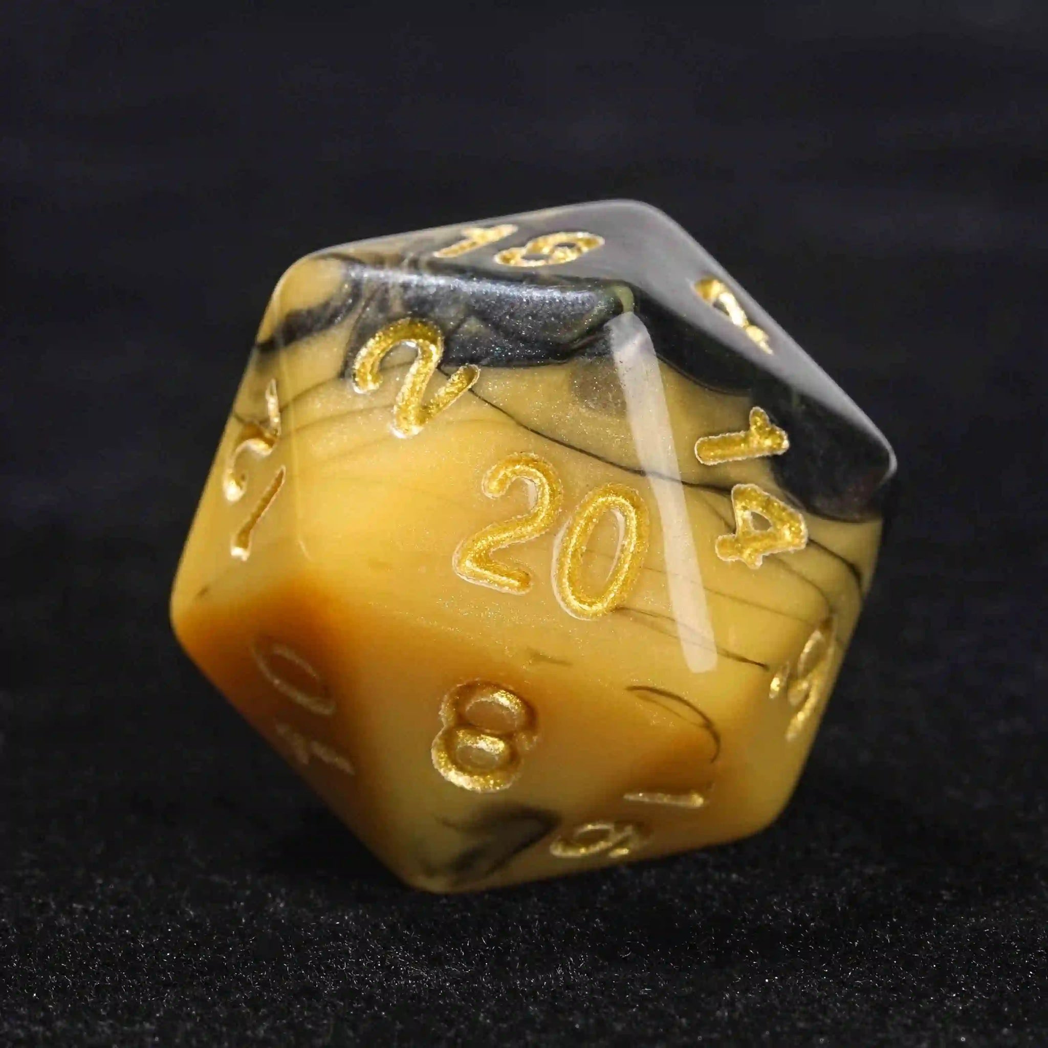 Black and yellow swirl Dungeons & Dragons polyhedron acrylic D20 dice with gold numbers | Bear Dice