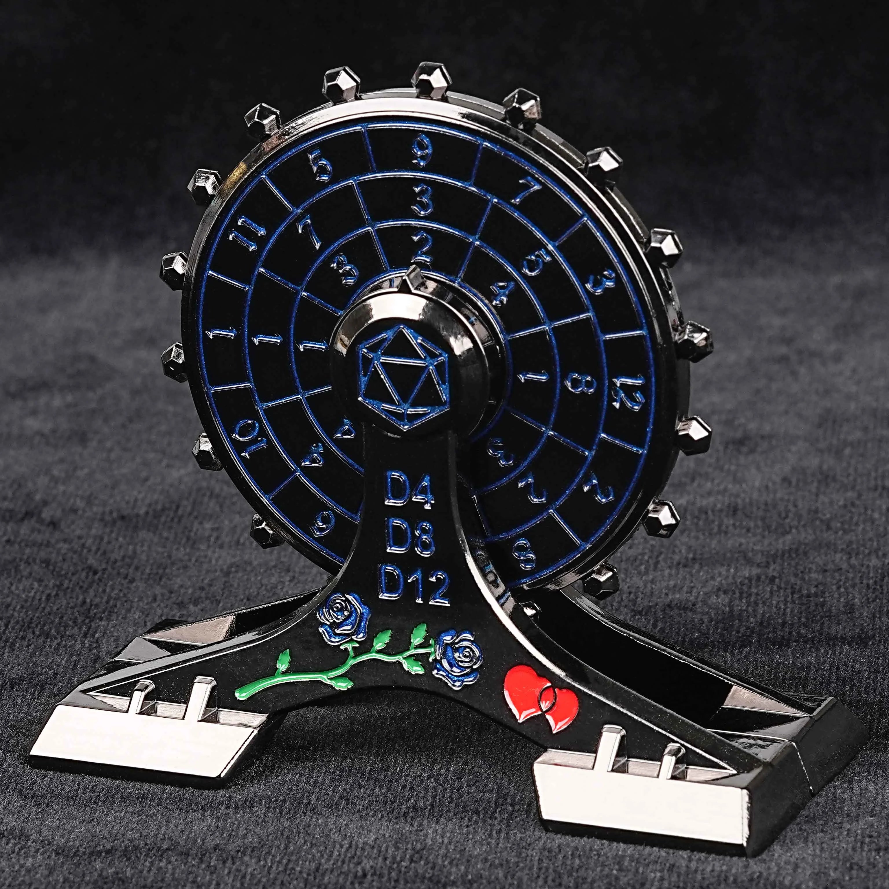 Black nickel metal Ferris wheel dice with blue numbers and a base plated with blue roses and red hearts | Bear Dice