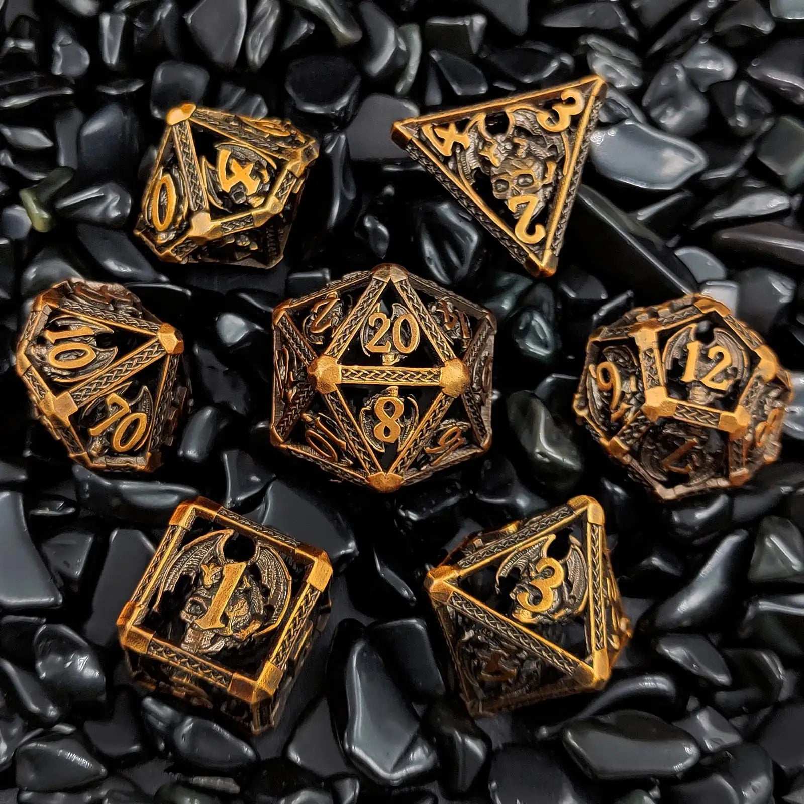 Cool ancient gold metal skull flying dragon hollow DND dice set | Bear Dice