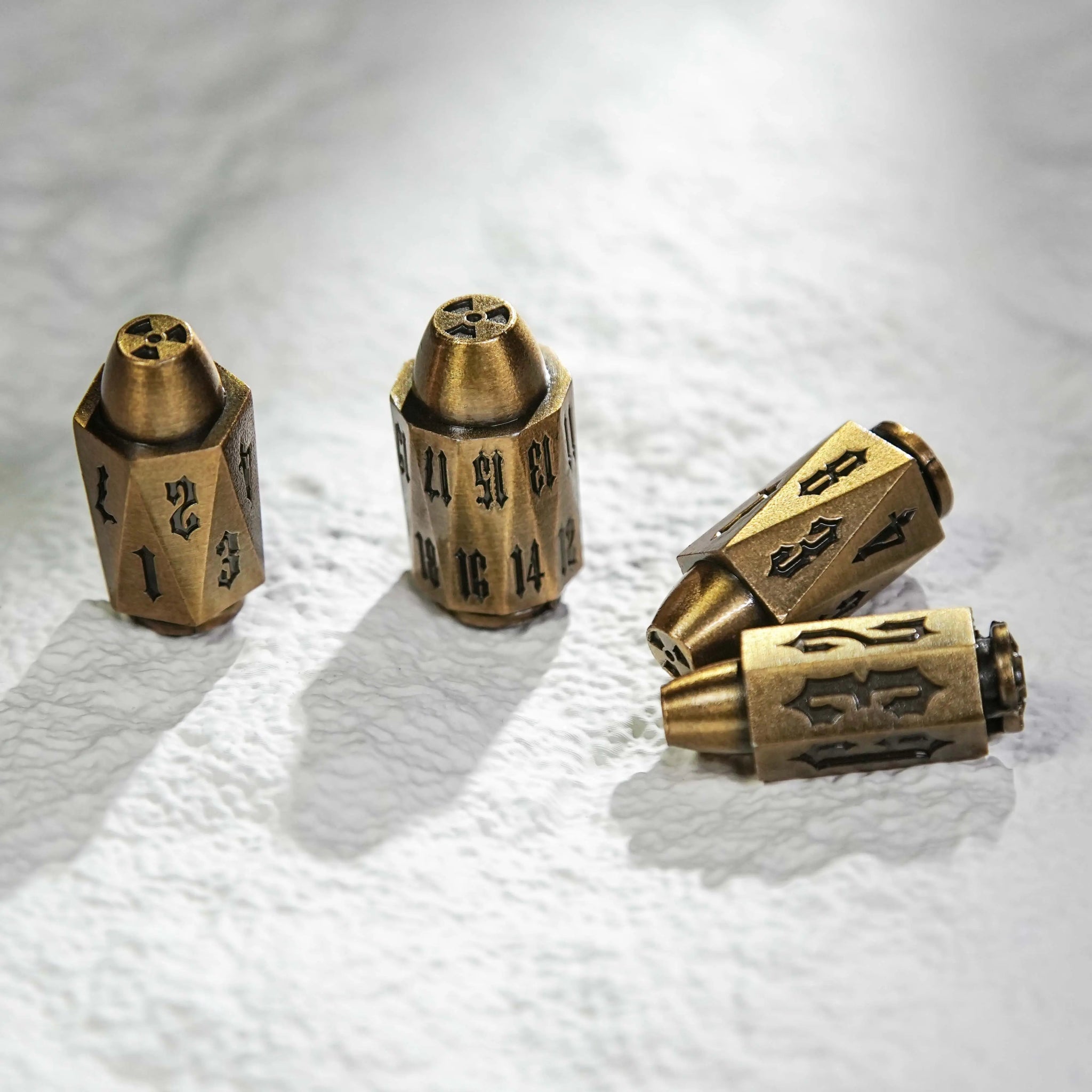 Cool antique gold polyhedron DND metal bullet dice set, Umbrella logo bullet dice set | Bear Dice