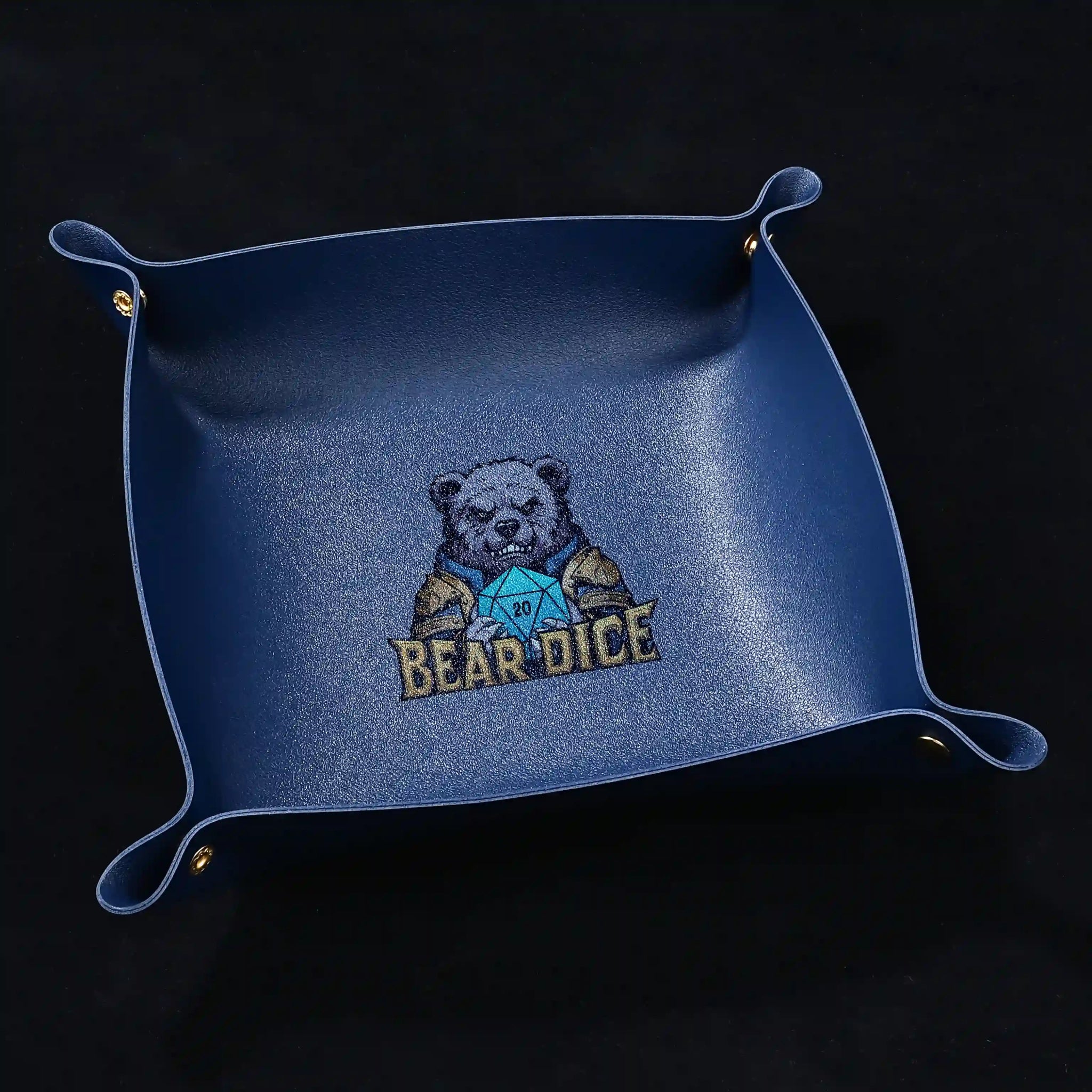 Custom blue leather DND dice tray with foldable, personalized dice roller and mat, featuring the Bear Dice logo printed in the center.