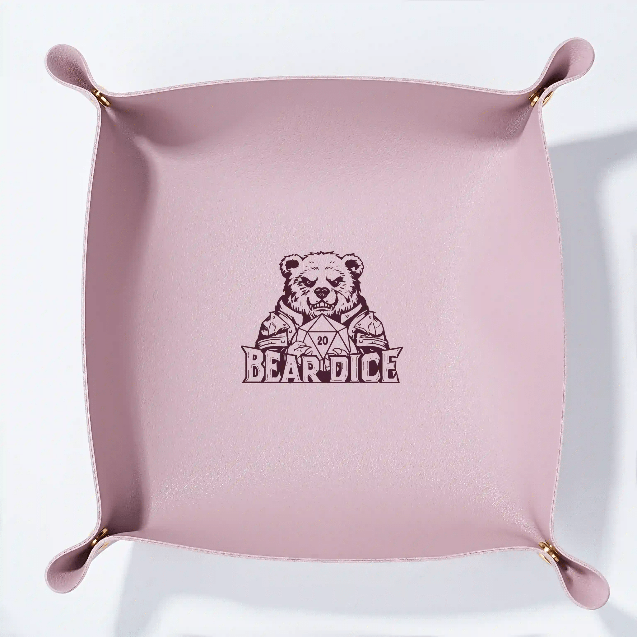 Custom pink leather DND dice tray with foldable, personalized dice roller and mat, featuring a black Bear Dice logo embossed in the center.