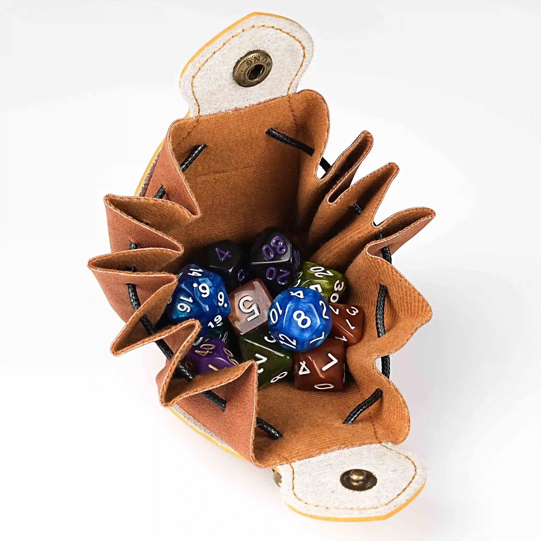 Interior details of the handcrafted yellow leather DND drawstring dice bag with button closure and printed Bear Dice logo, holds two sets of acrylic dice | Bear Dice
