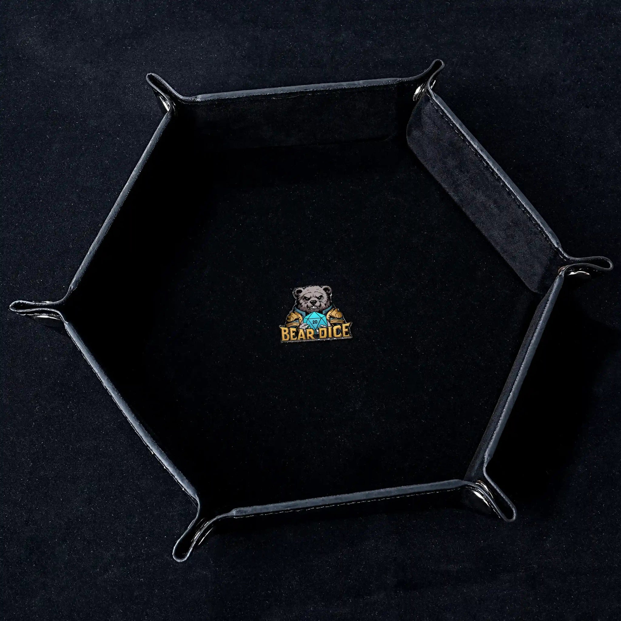 Hexagonal black leather RPG dice tray with silver buckle, featuring the Bear Dice logo in the center | Bear Dice