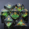 Green liquid core resin DND Plague Dice Set, with plague patterns engraved on the face of the highest number in D20, and engraved gold numbers | Bear Dice