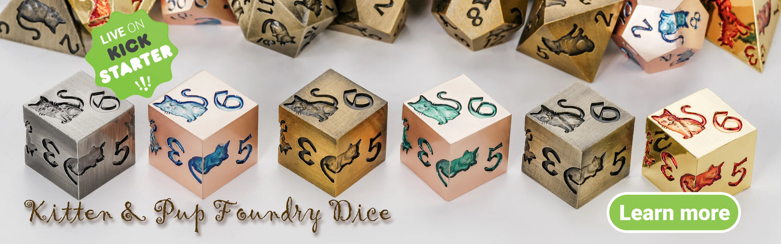 A complete set of adorable metal cat-themed dice from Kitten & Pup Foundry Dice is currently being crowdfunded on Kickstarter, showcasing various colors and engraving designs. | BearDice