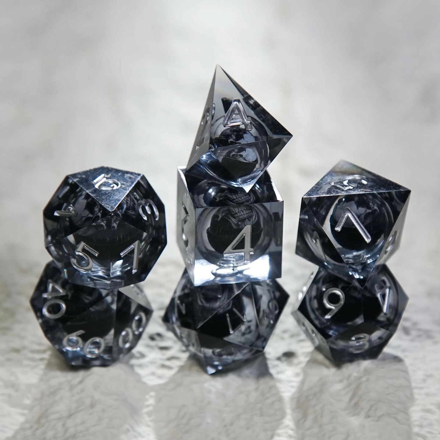 Dark Sorcerer's Skull Frame Liquid Core Resin Dice  Set + Silver Font | Bear Dice