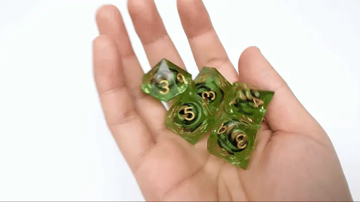 Liquid core Dragon Eye D10 dice shaking in hand | Bear Dice