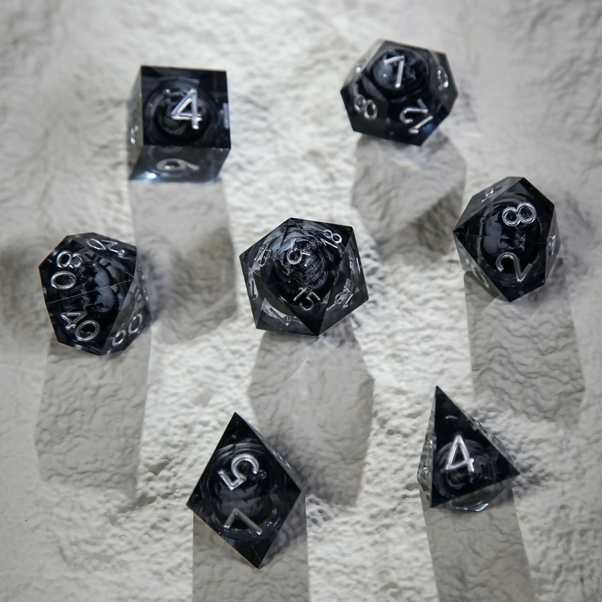 Dark Sorcerer's Skull Frame Liquid Core Resin Dice  Set + Silver Font | Bear Dice