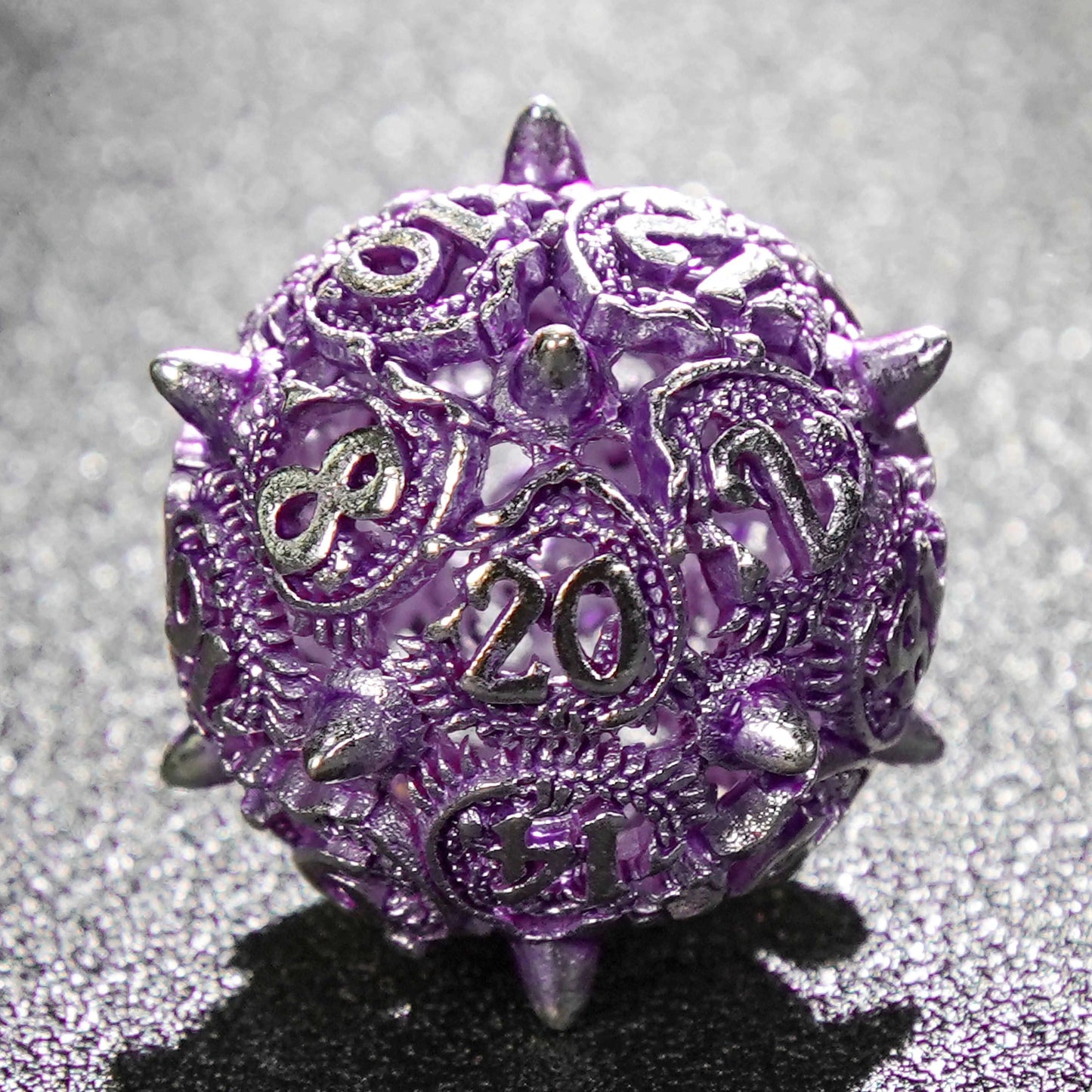 Bullet-shaped skeletonized metal dnd 20 sided dice + silver purple | Bear Dice
