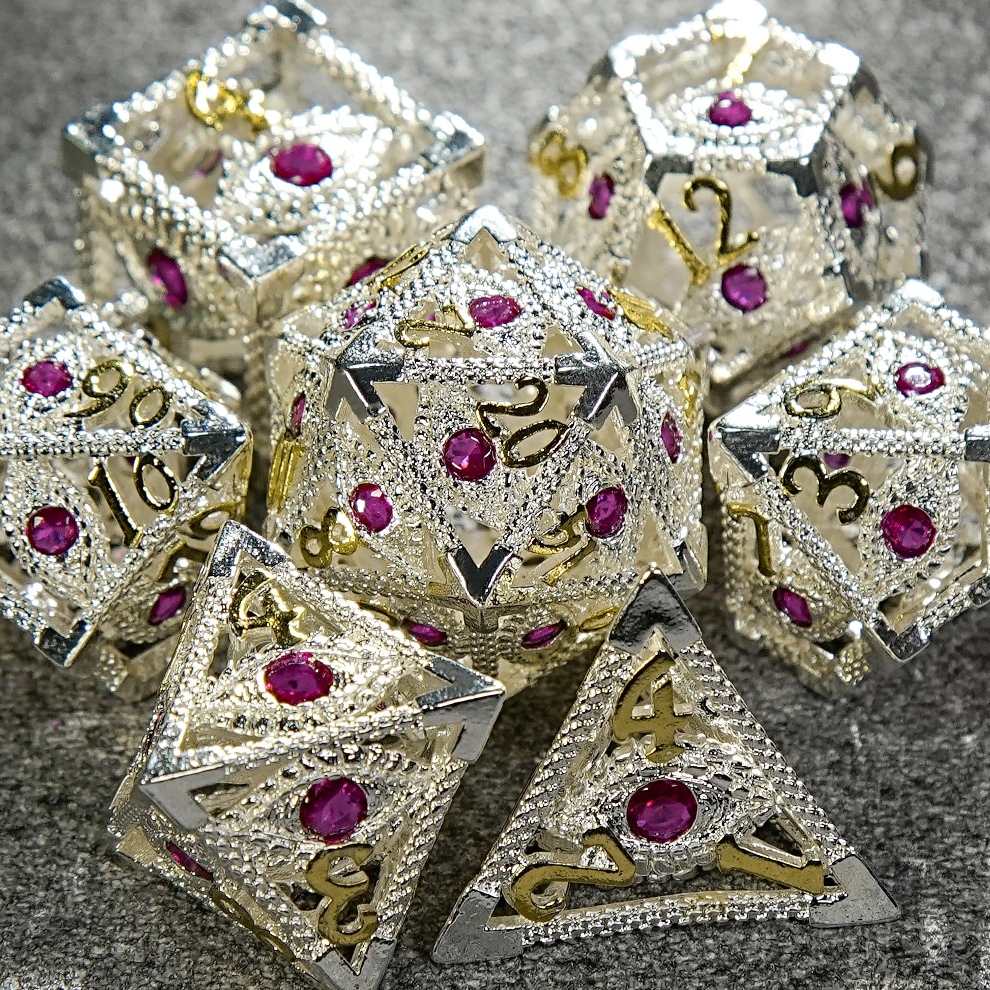 Silver with Pink Gems Dragon's Eye Hollow Metal RPG dice set | Bear Dice