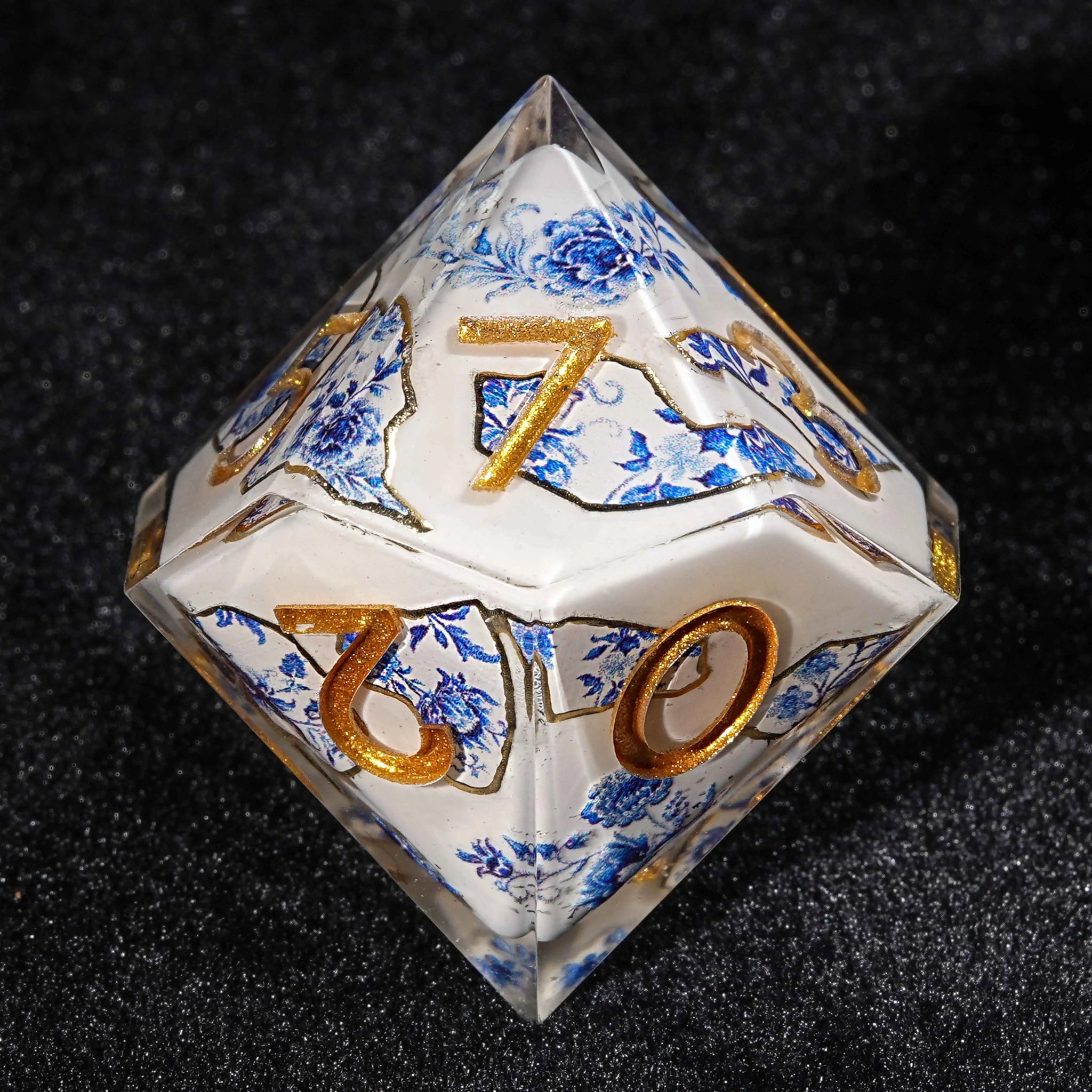 Transparent resin Oriental Blue and White Porcelain DND D10 dice, featuring a blue and white porcelain fragment pattern with blue flowers and plants | Bear Dice