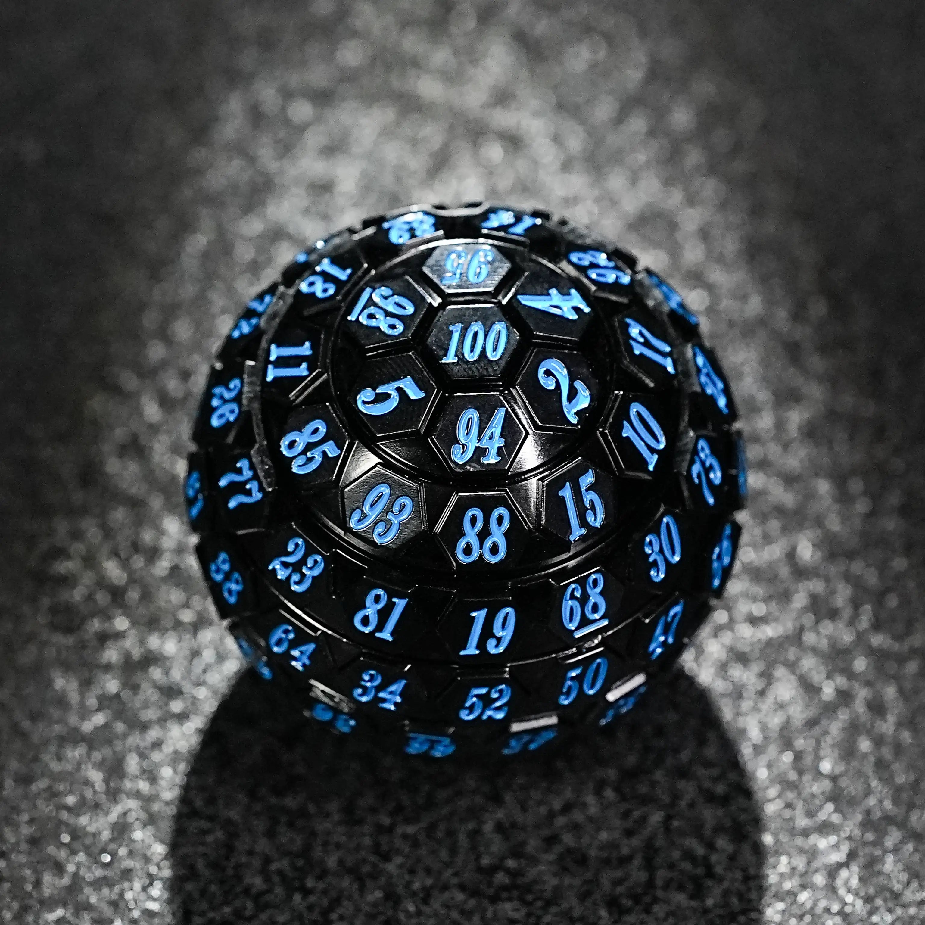 Premium black acrylic D100 dice with vibrant blue numbering and unique spherical design | Bear Dice