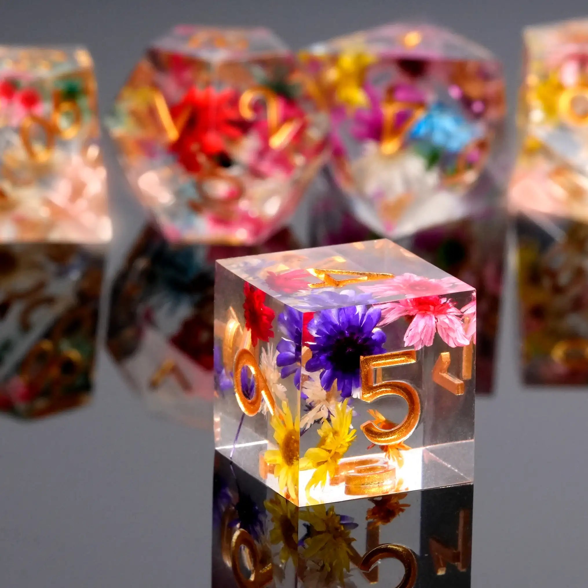 Transparent polyhedron DND colored dried flower D6 resin dice with engraved gold lettering and sharp edges | Bear Dice