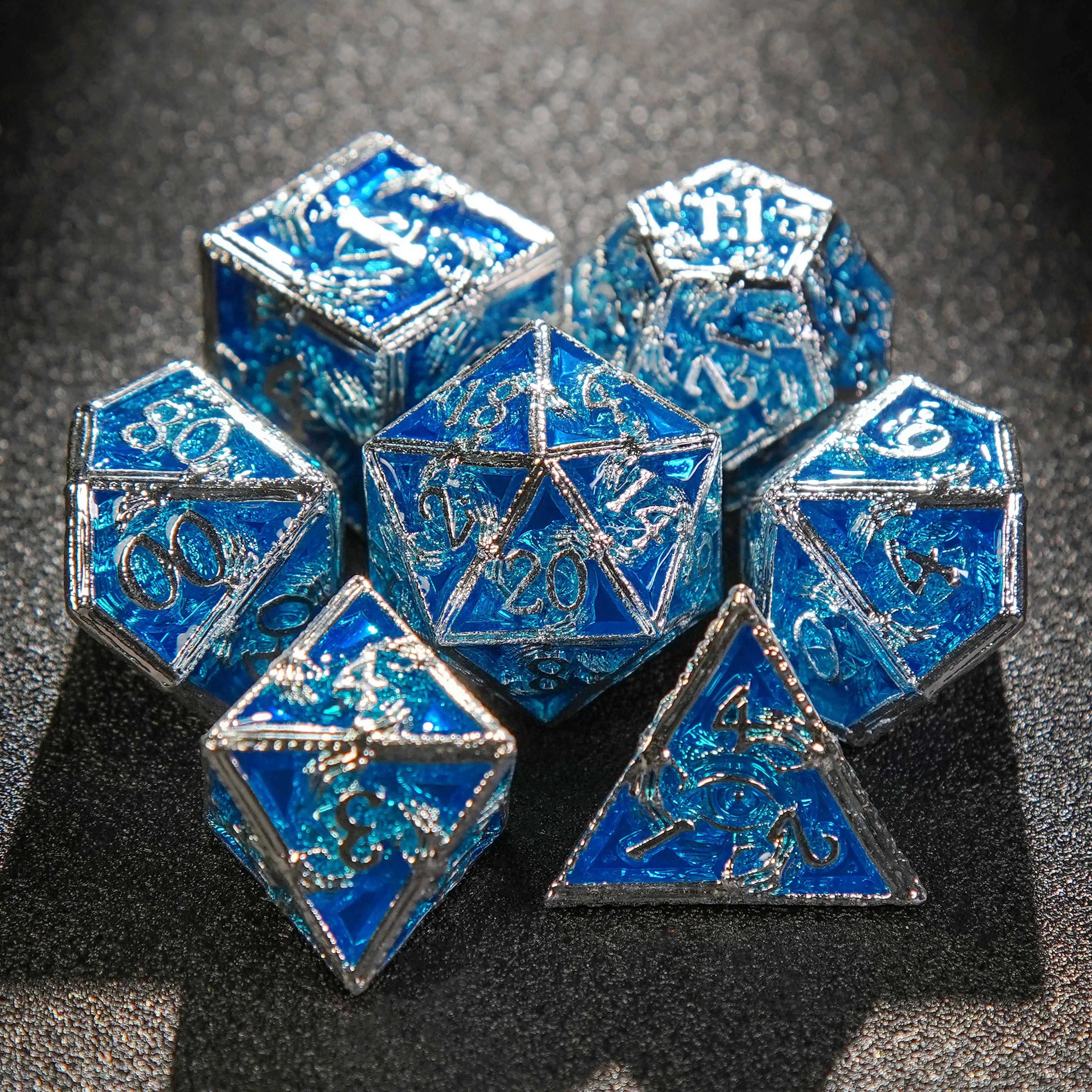 silver-blue metal skeleton hand surrounds the DND dice set | Bear Dice